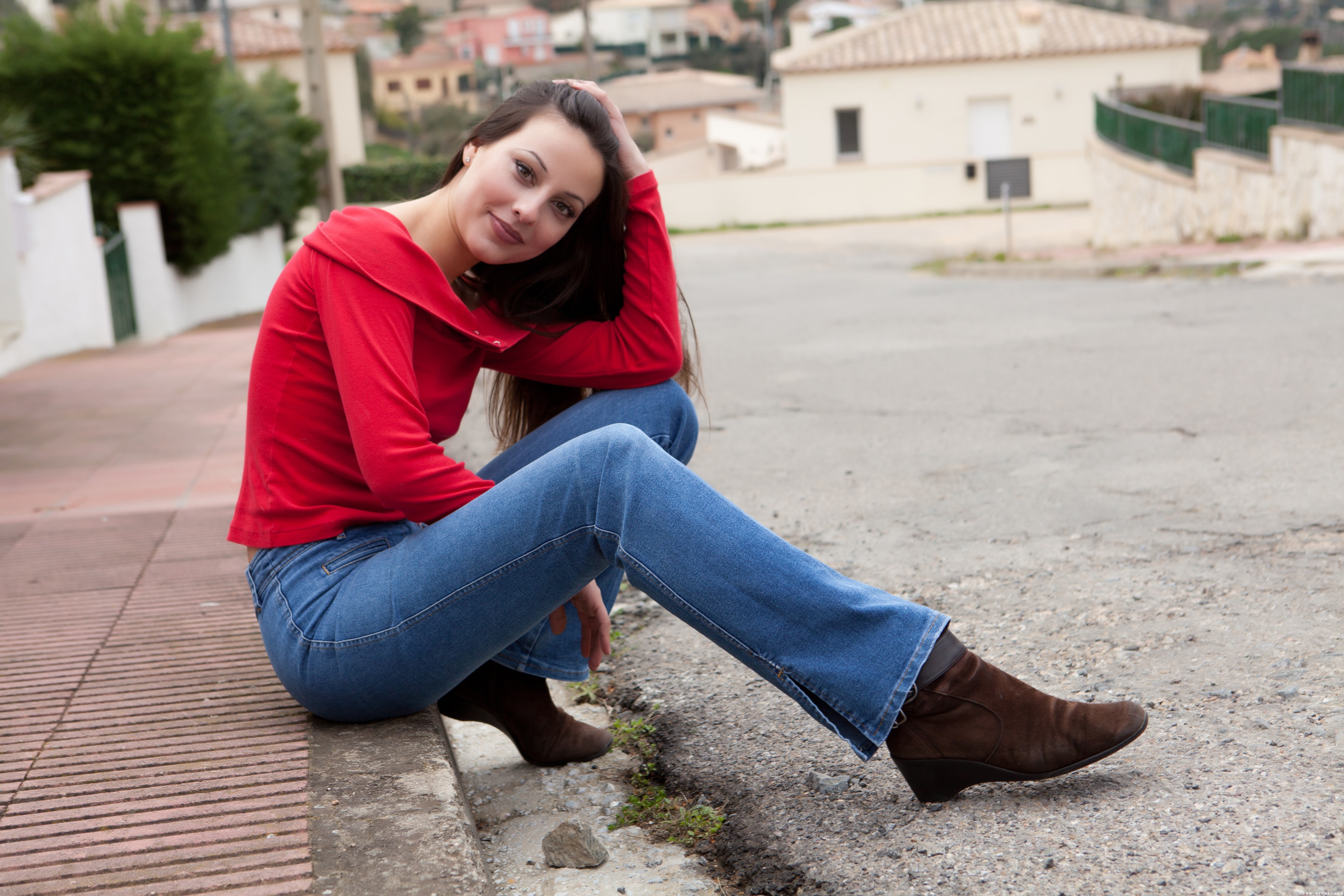 Lorena Garcia Wearing Red Sweater on Street Curb HD Wallpaper