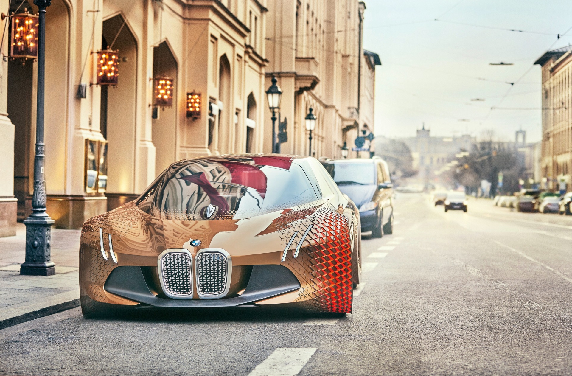 BMW Vision Next 100 concept car on city street HD Wallpaper