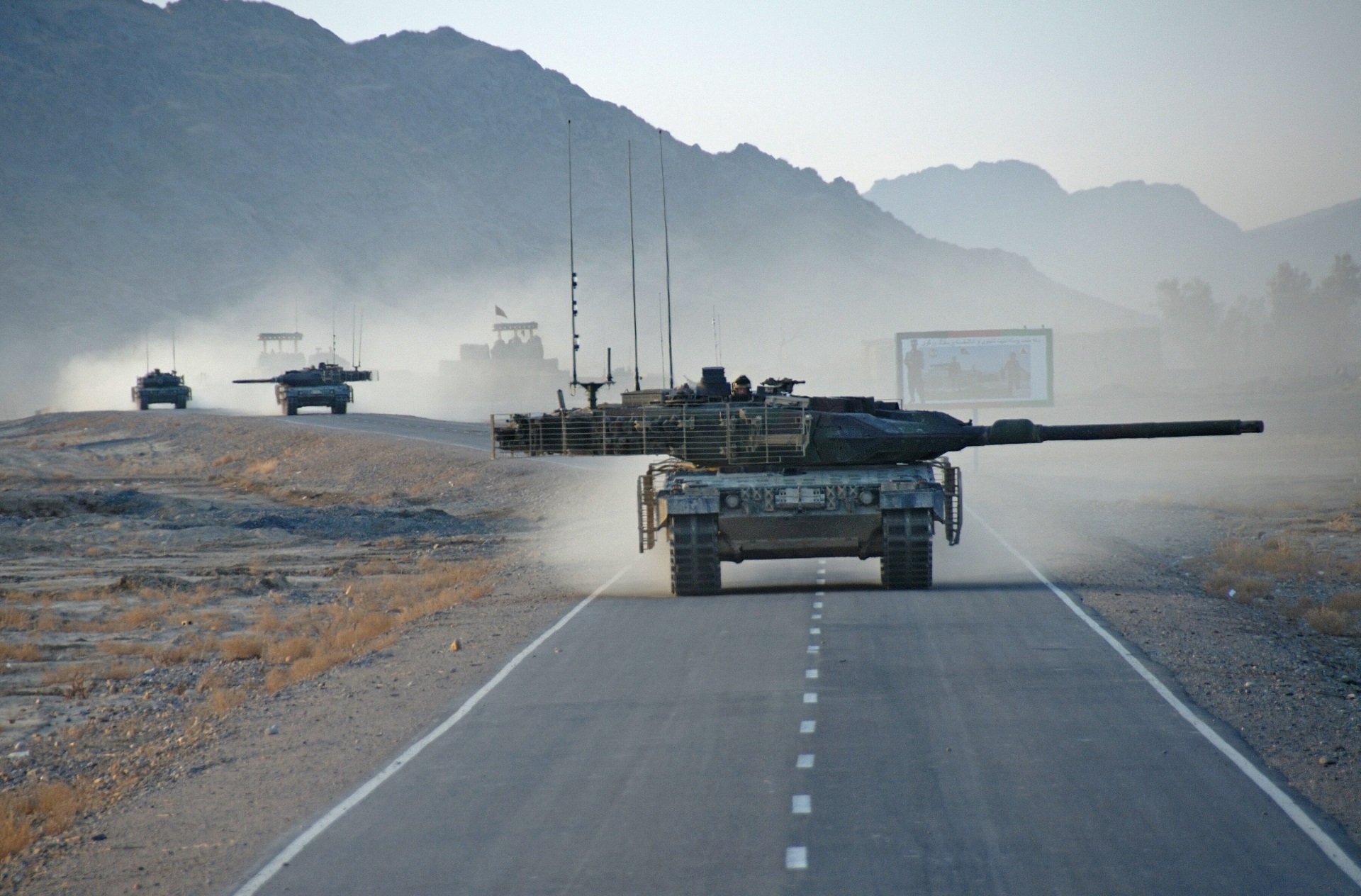 Leopard 2A6 tanks on a road HD Wallpaper