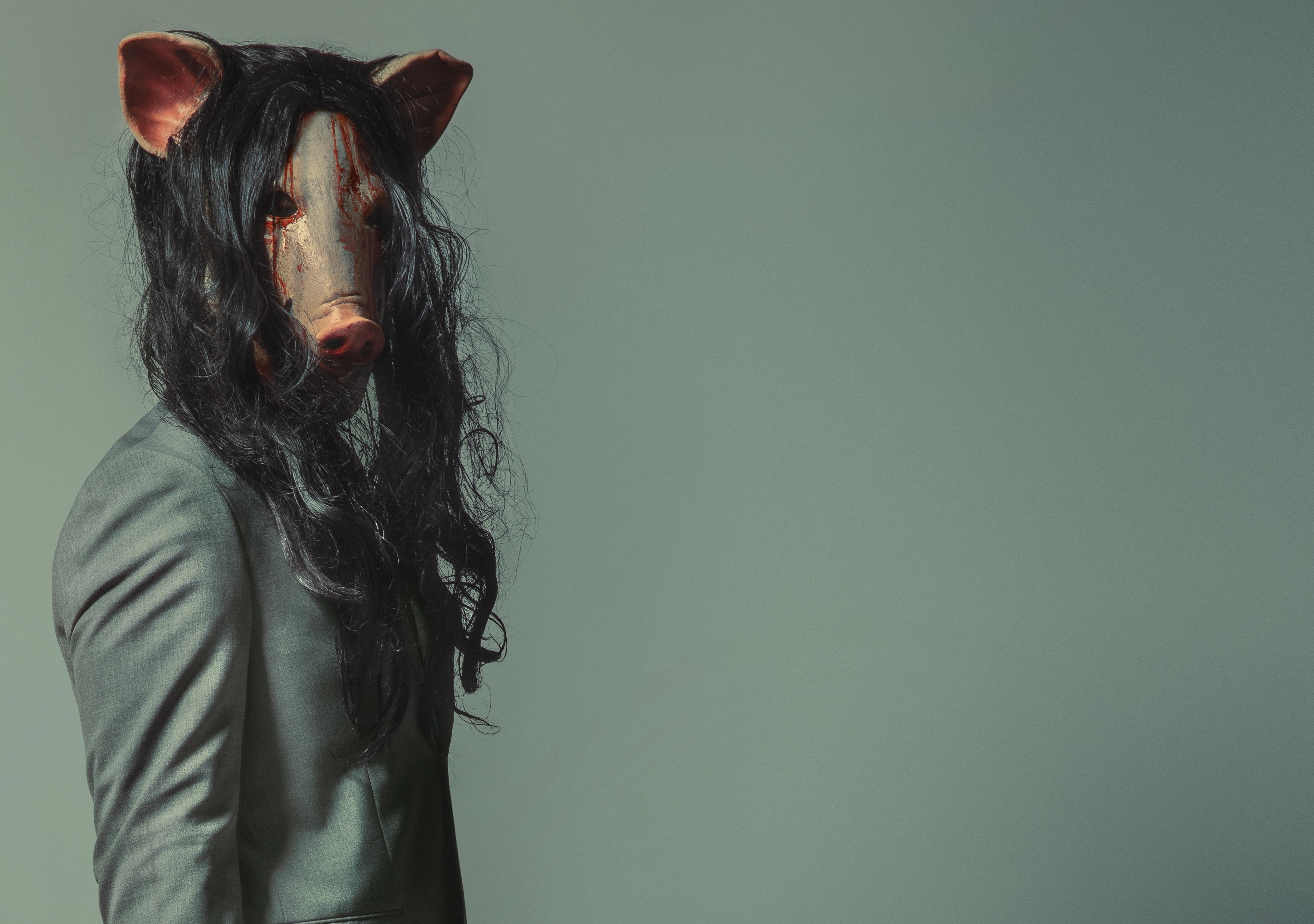 Person wearing a pig mask and suit HD Wallpaper