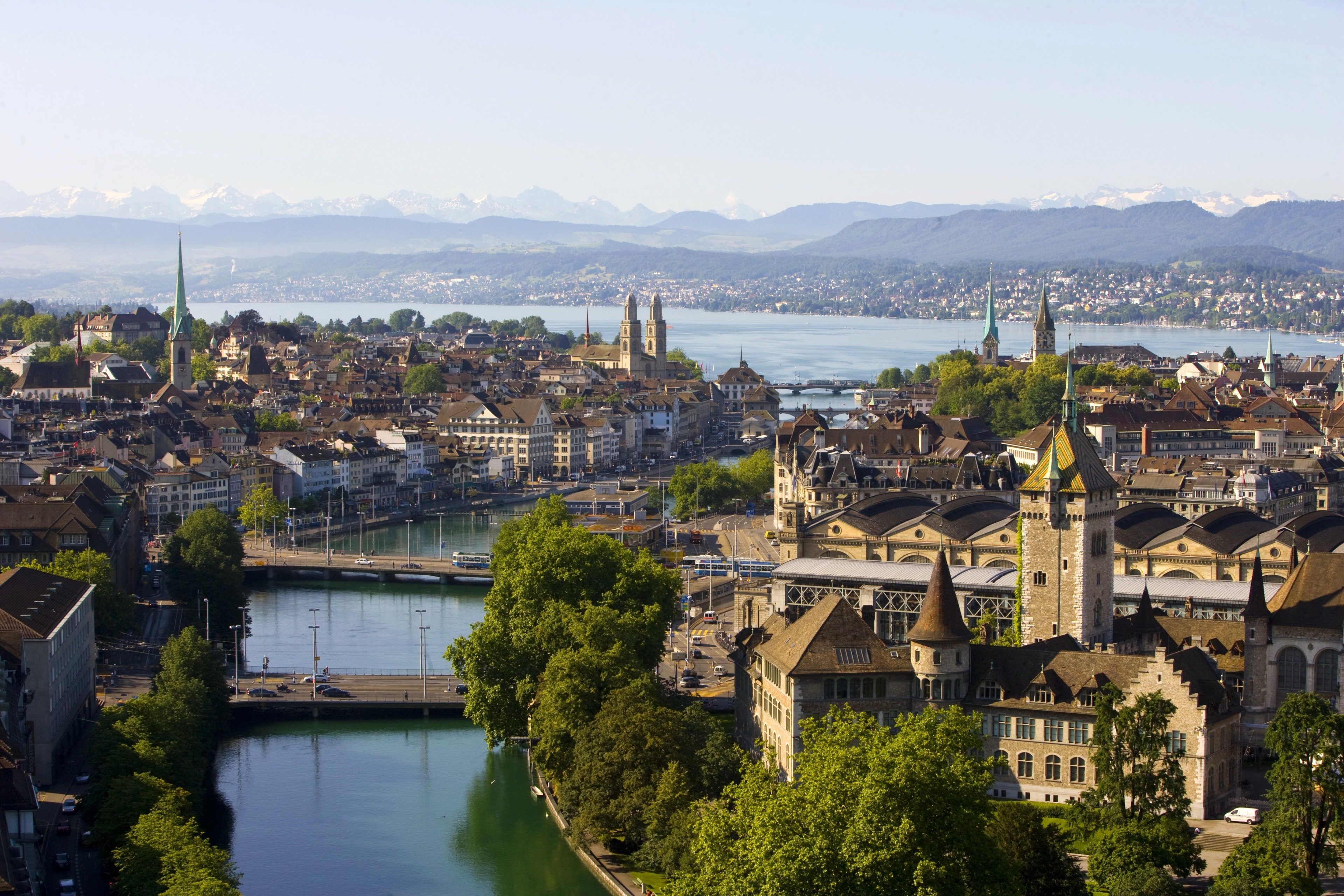 Zurich cityscape with river and mountains HD Wallpaper