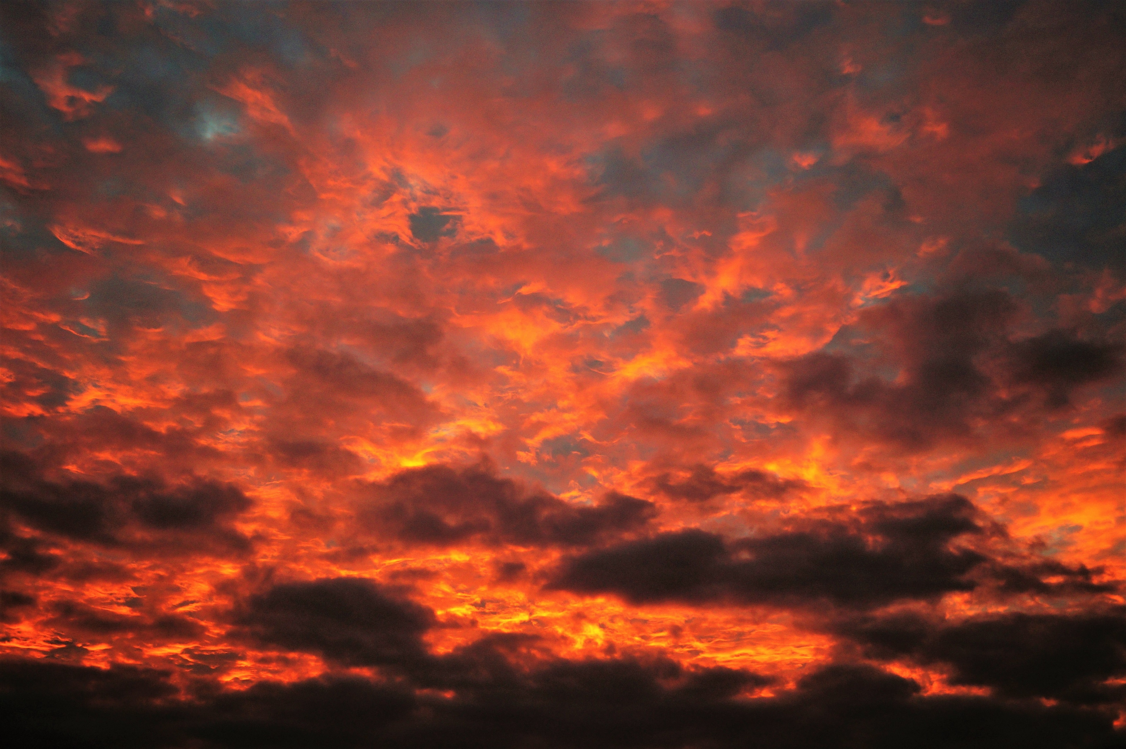Fiery sunset sky with dramatic clouds HD Wallpaper