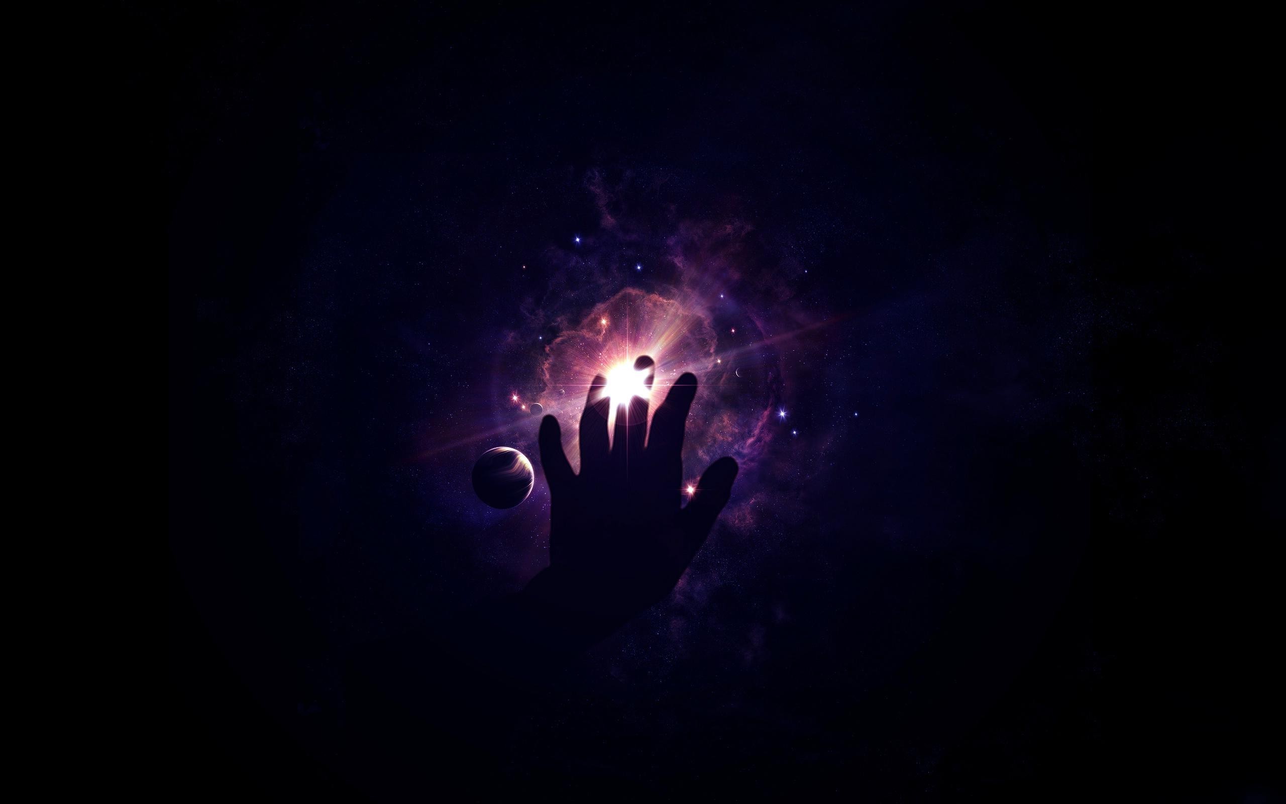 Hand reaching into a purple nebula with a planet HD Wallpaper