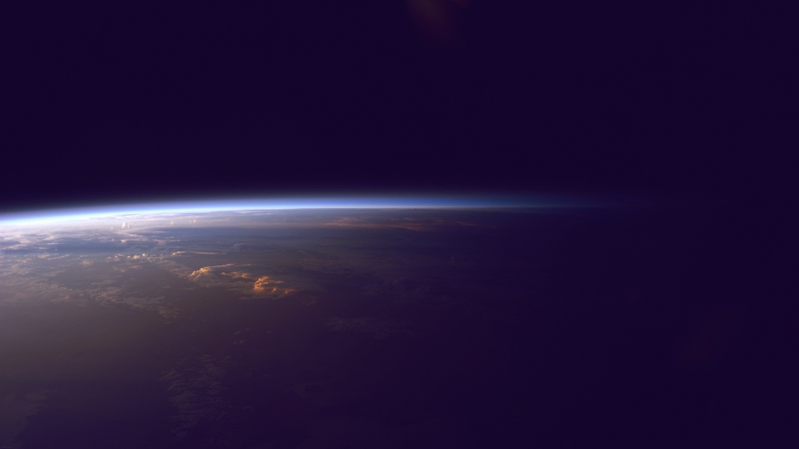 Earth's atmosphere from space at sunset HD Wallpaper
