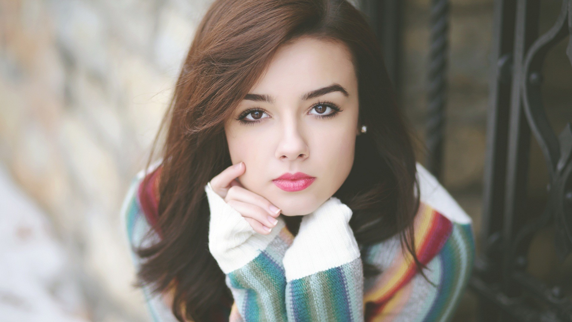 Young woman with brown hair and eyes HD Wallpaper