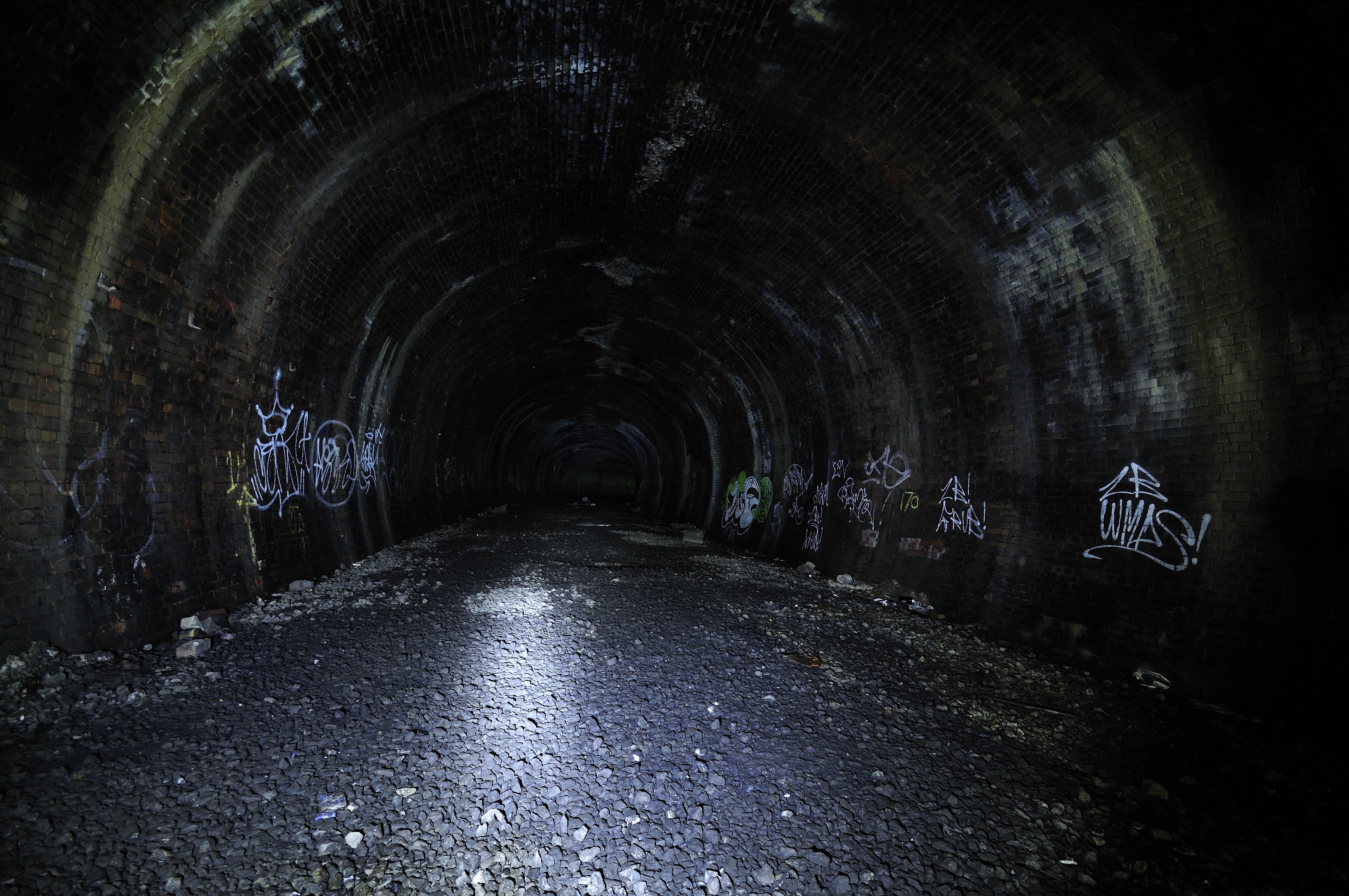 Dark tunnel with graffiti HD Wallpaper