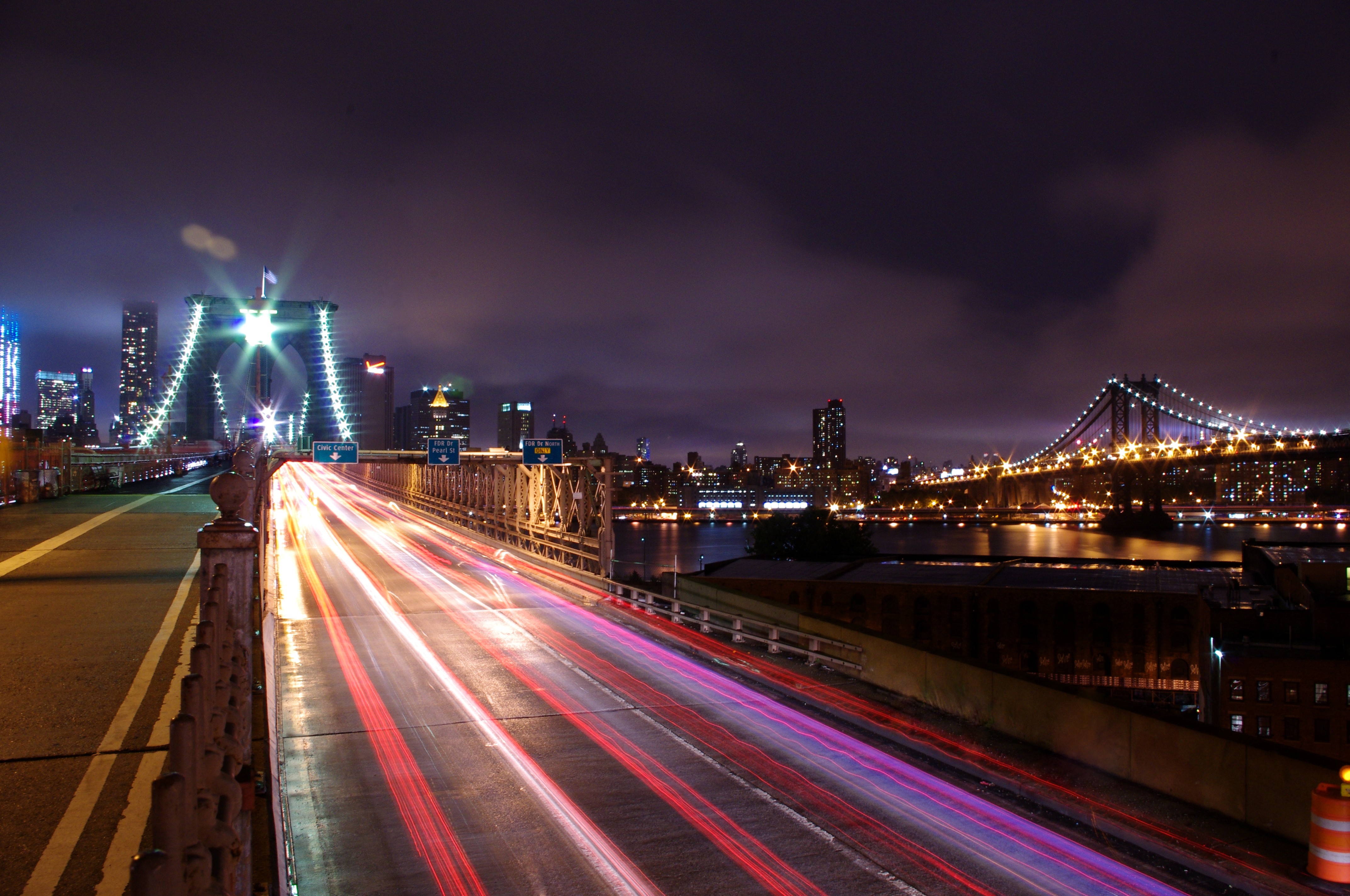 Brooklyn Bridge at Night with Light Trails in New York City HD Wallpaper
