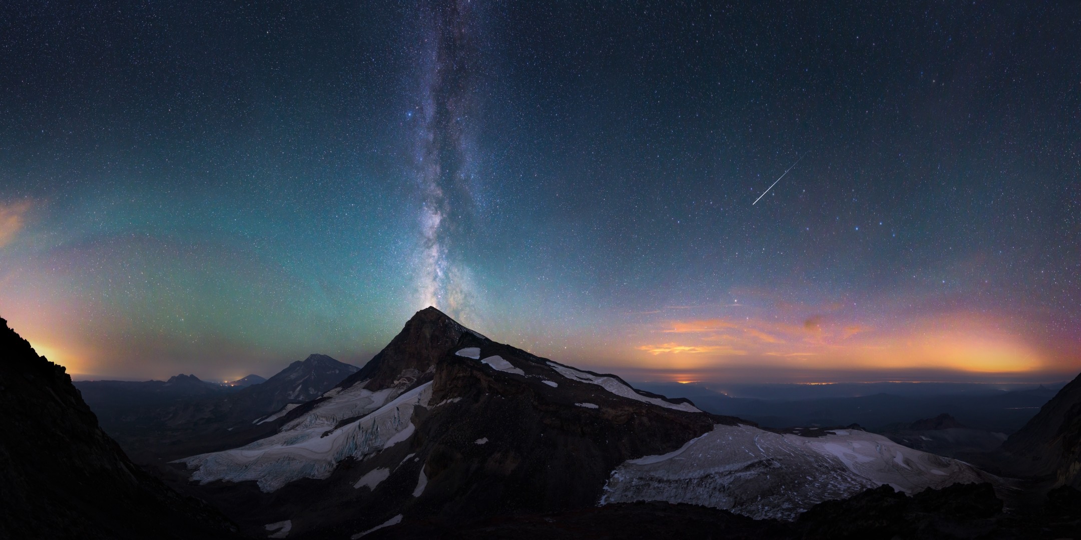 Milky Way over snow-capped mountains at night HD Wallpaper
