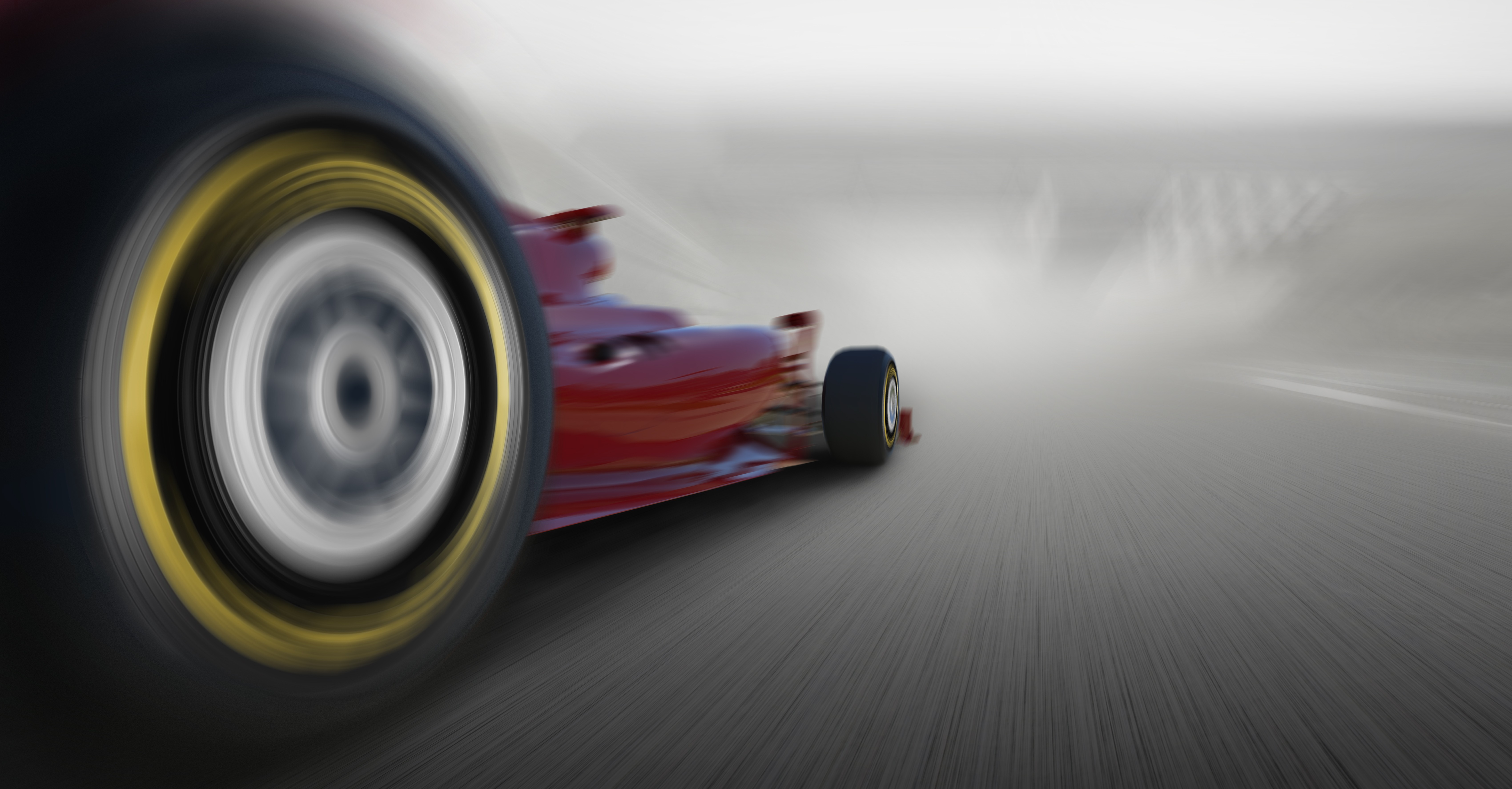 Red Formula 1 car with motion blur on track HD Wallpaper