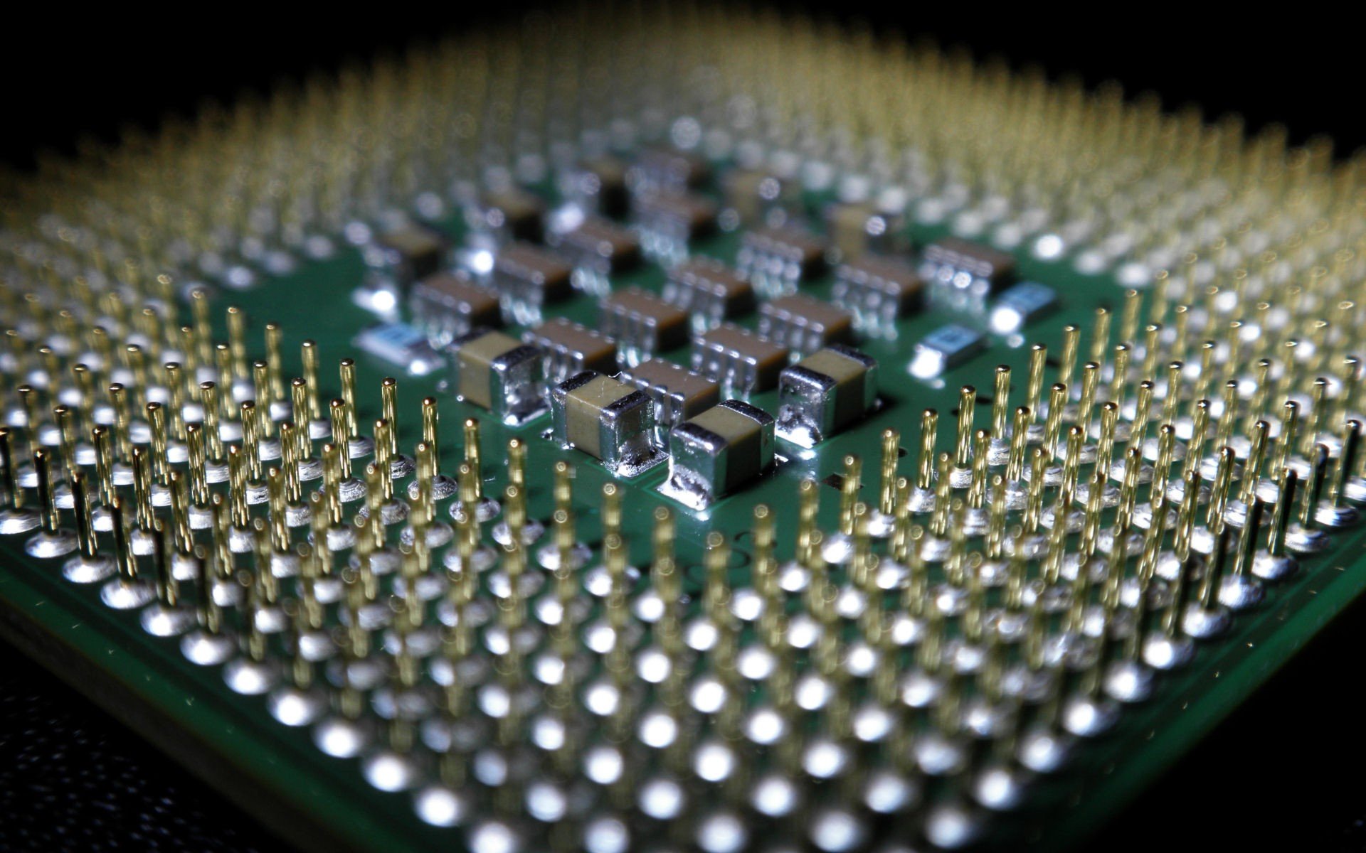 Close-up of a computer CPU processor with pins HD Wallpaper