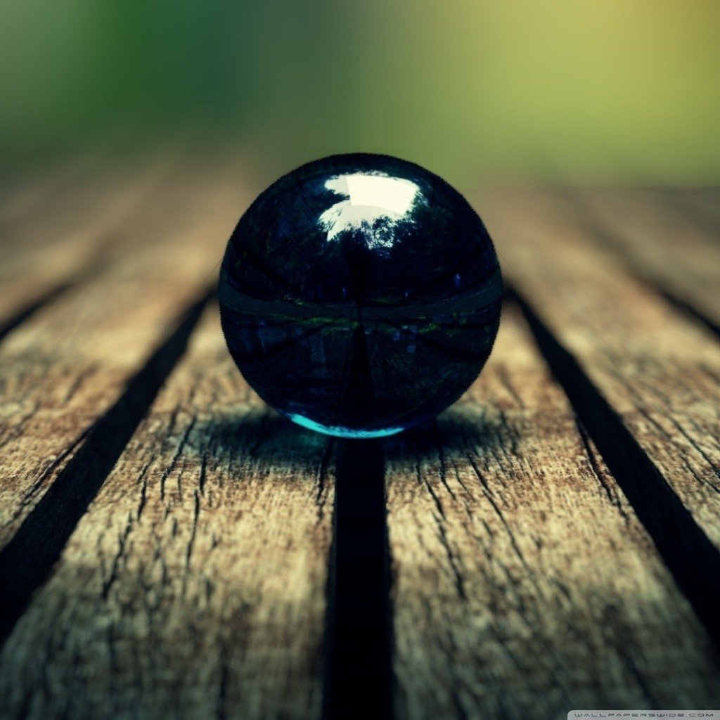 Dark blue marble on wooden planks HD Wallpaper