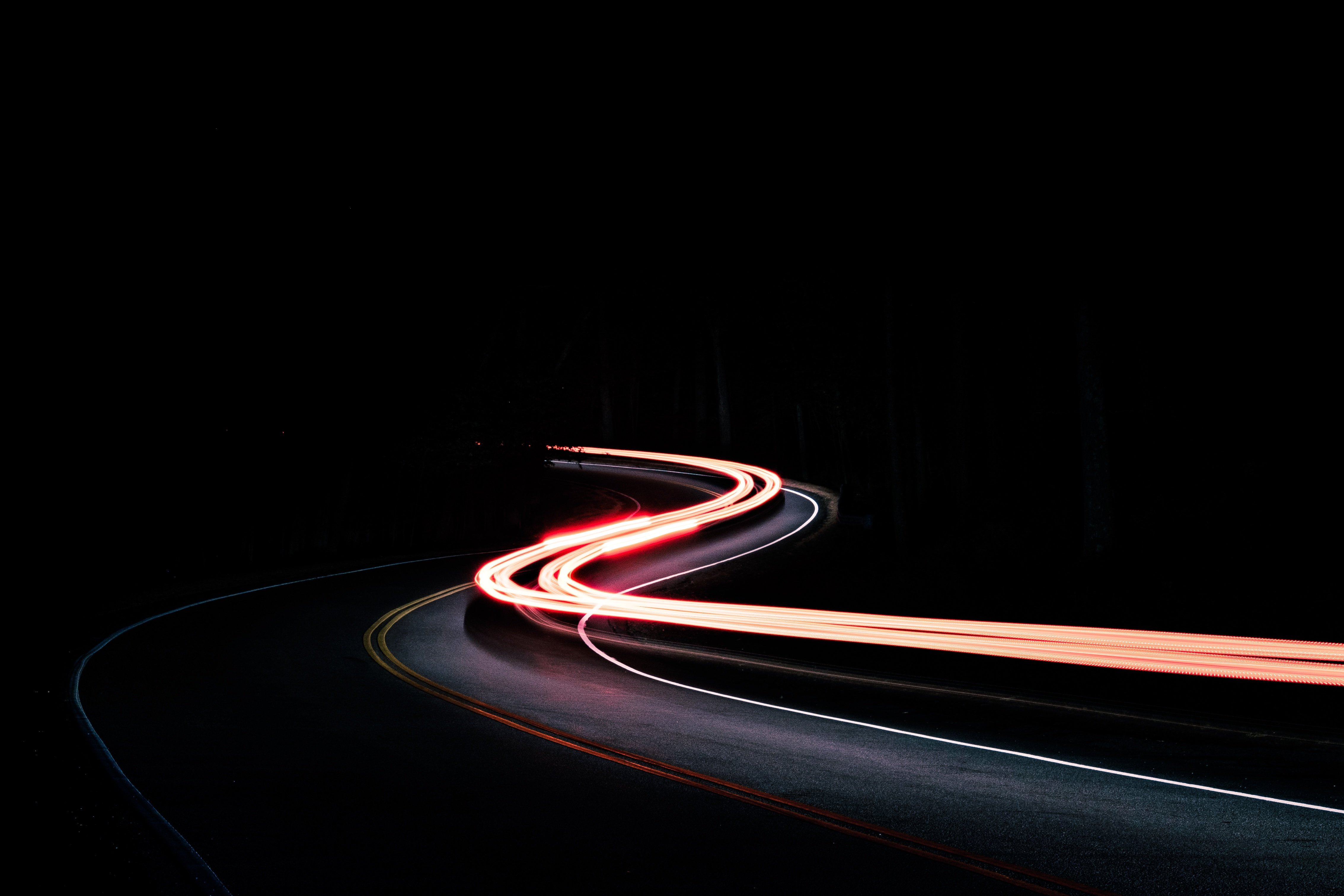 Road light trails at night HD Wallpaper