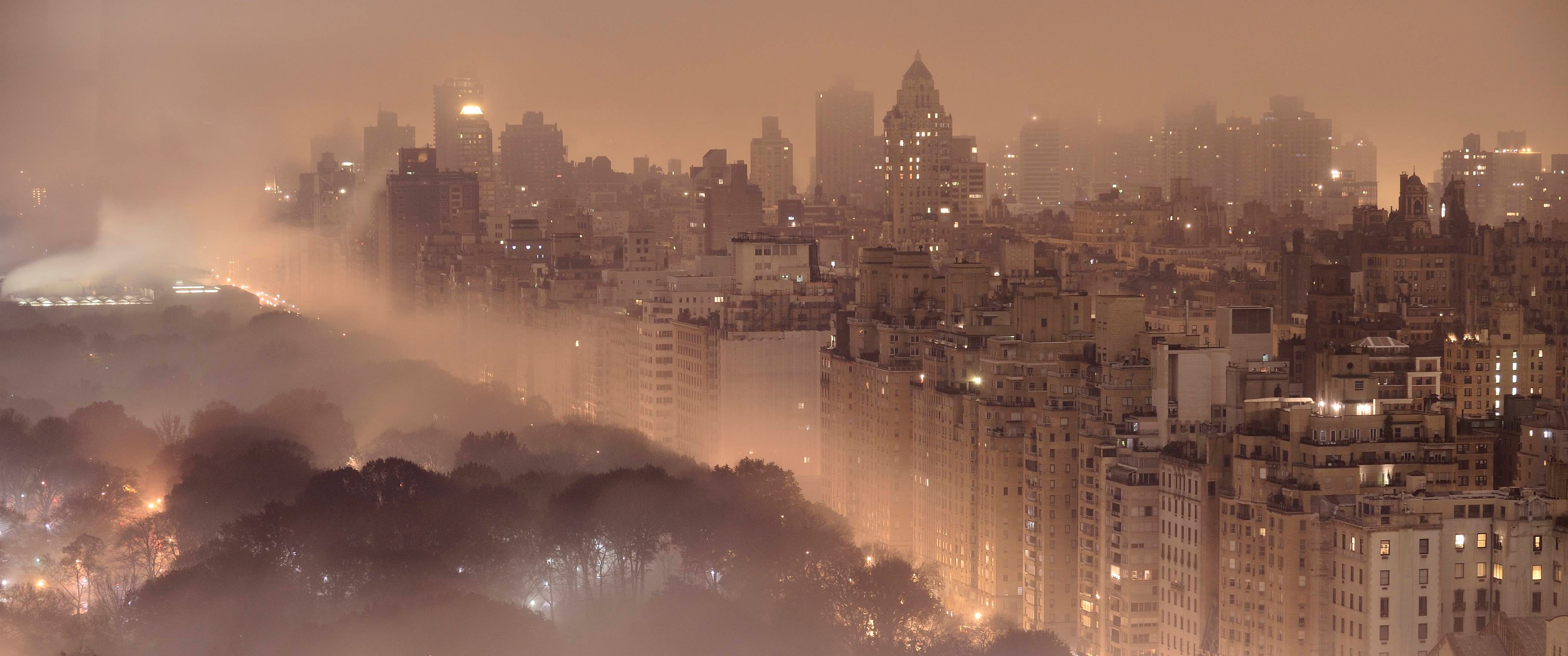New York City cityscape at night with fog HD Wallpaper