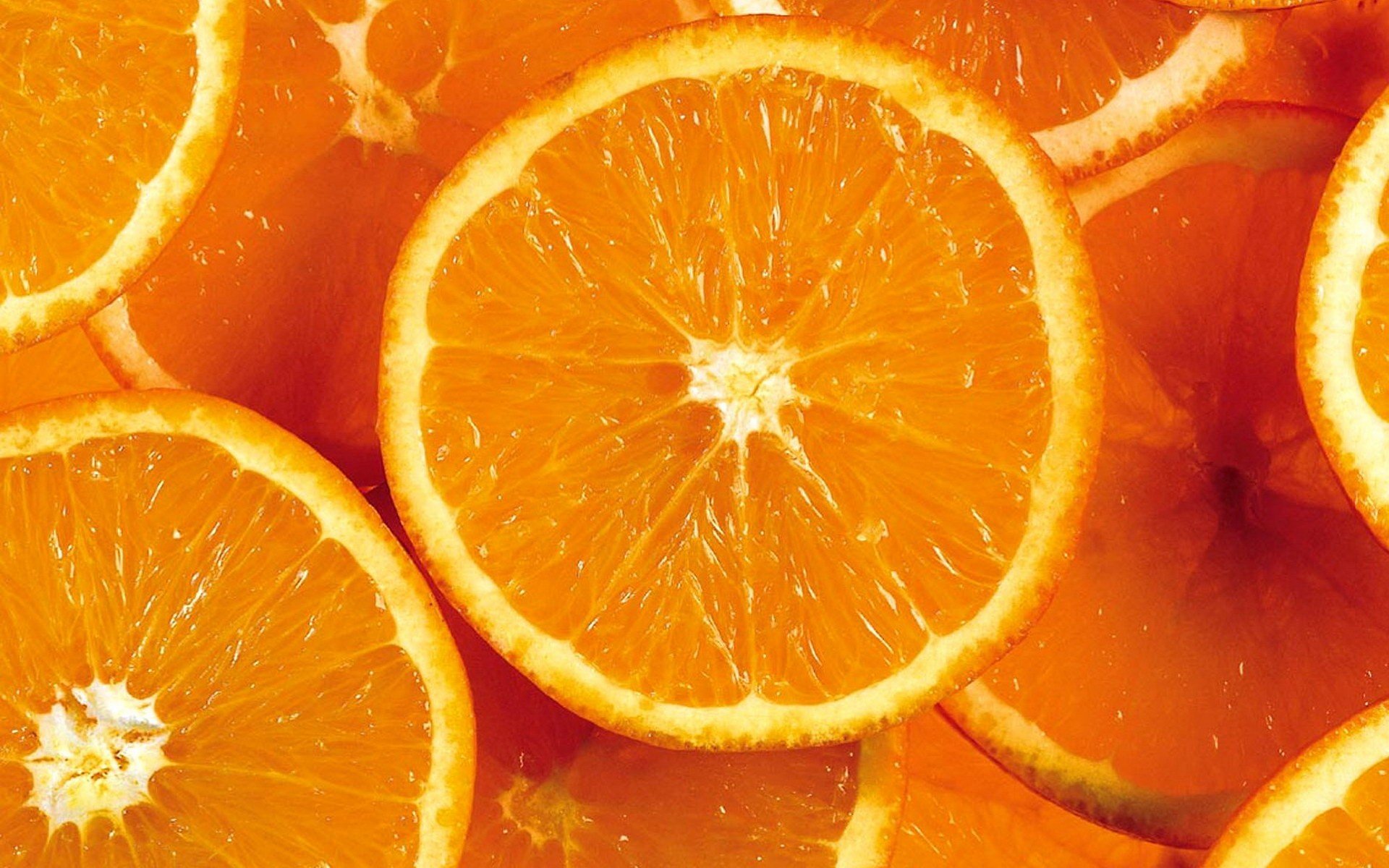 Close-up of sliced oranges HD Wallpaper