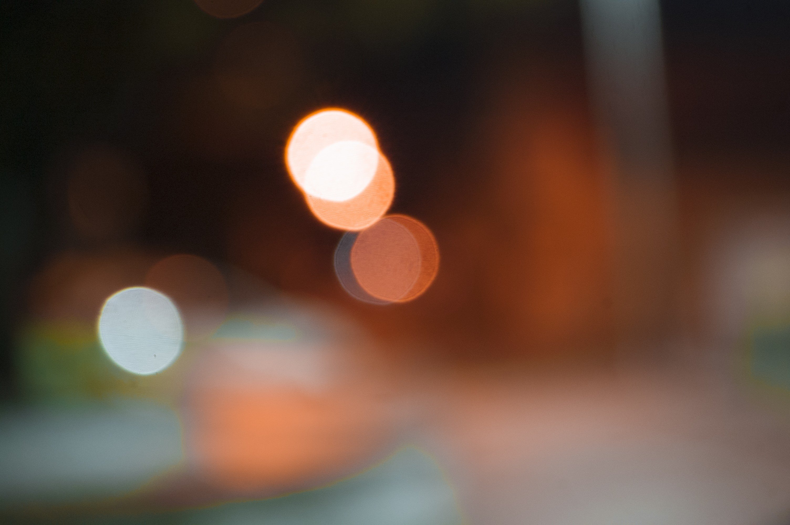Bokeh lights in orange and white HD Wallpaper