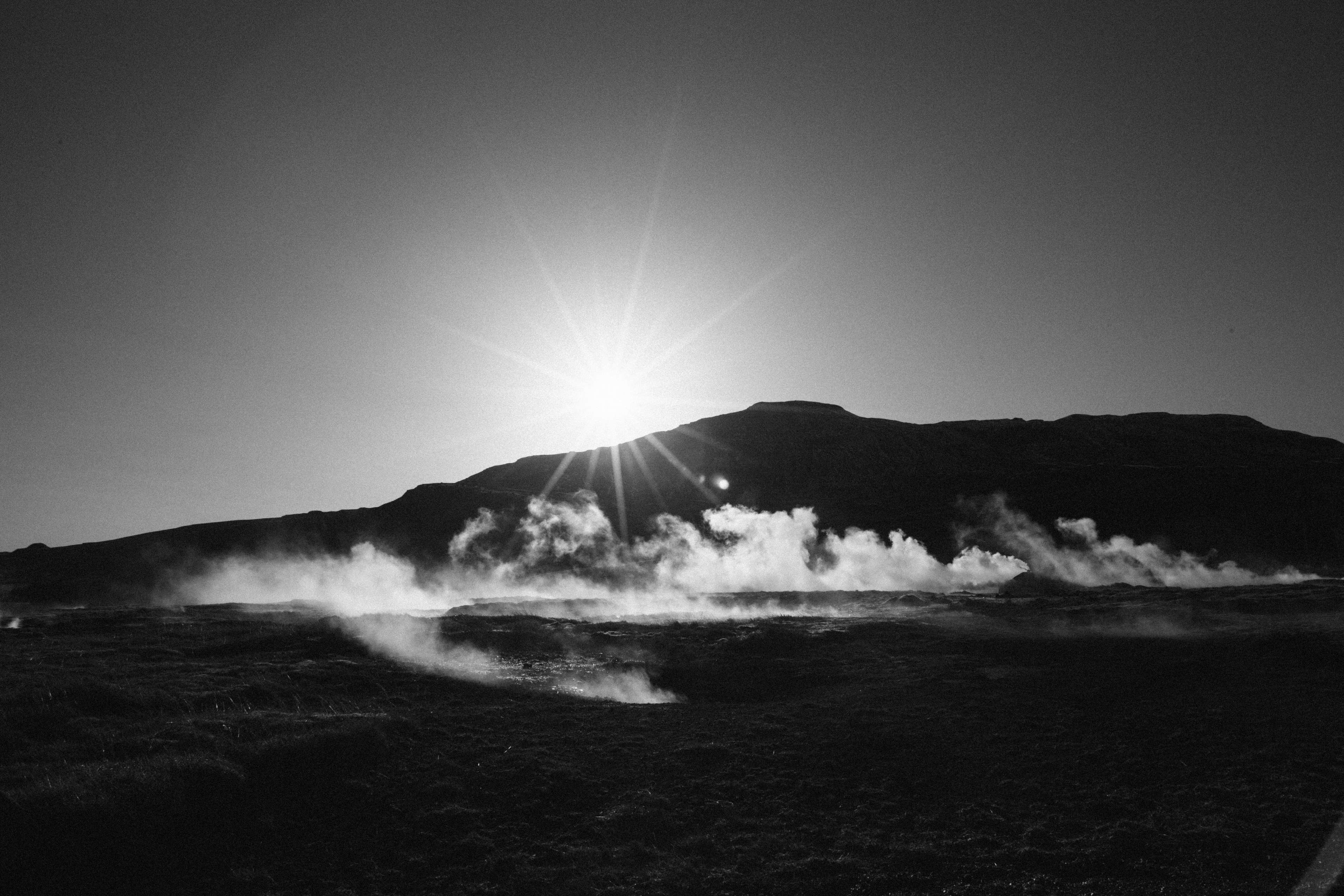 Sunrise over steaming geothermal landscape HD Wallpaper