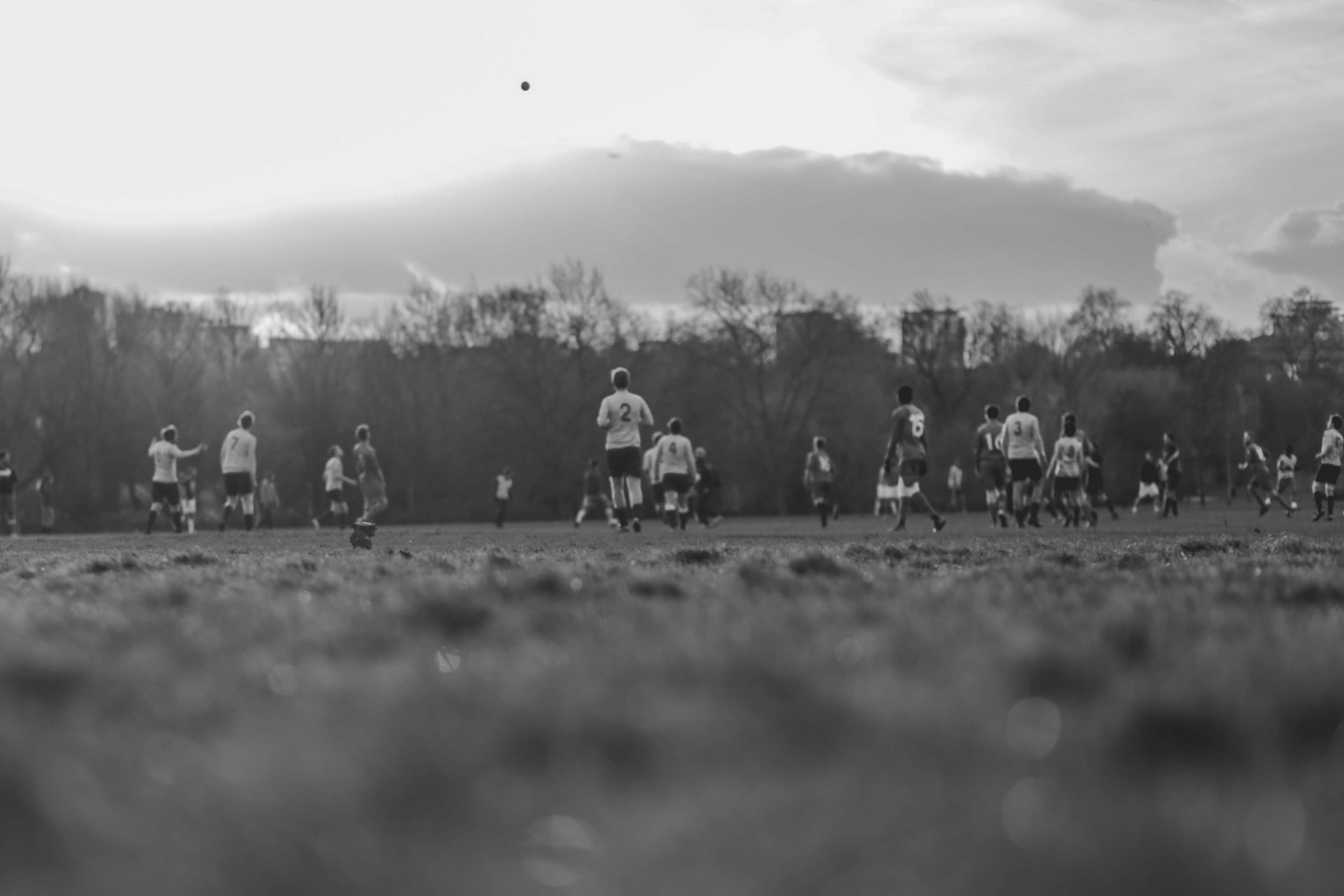 Soccer players on a field during a game HD Wallpaper