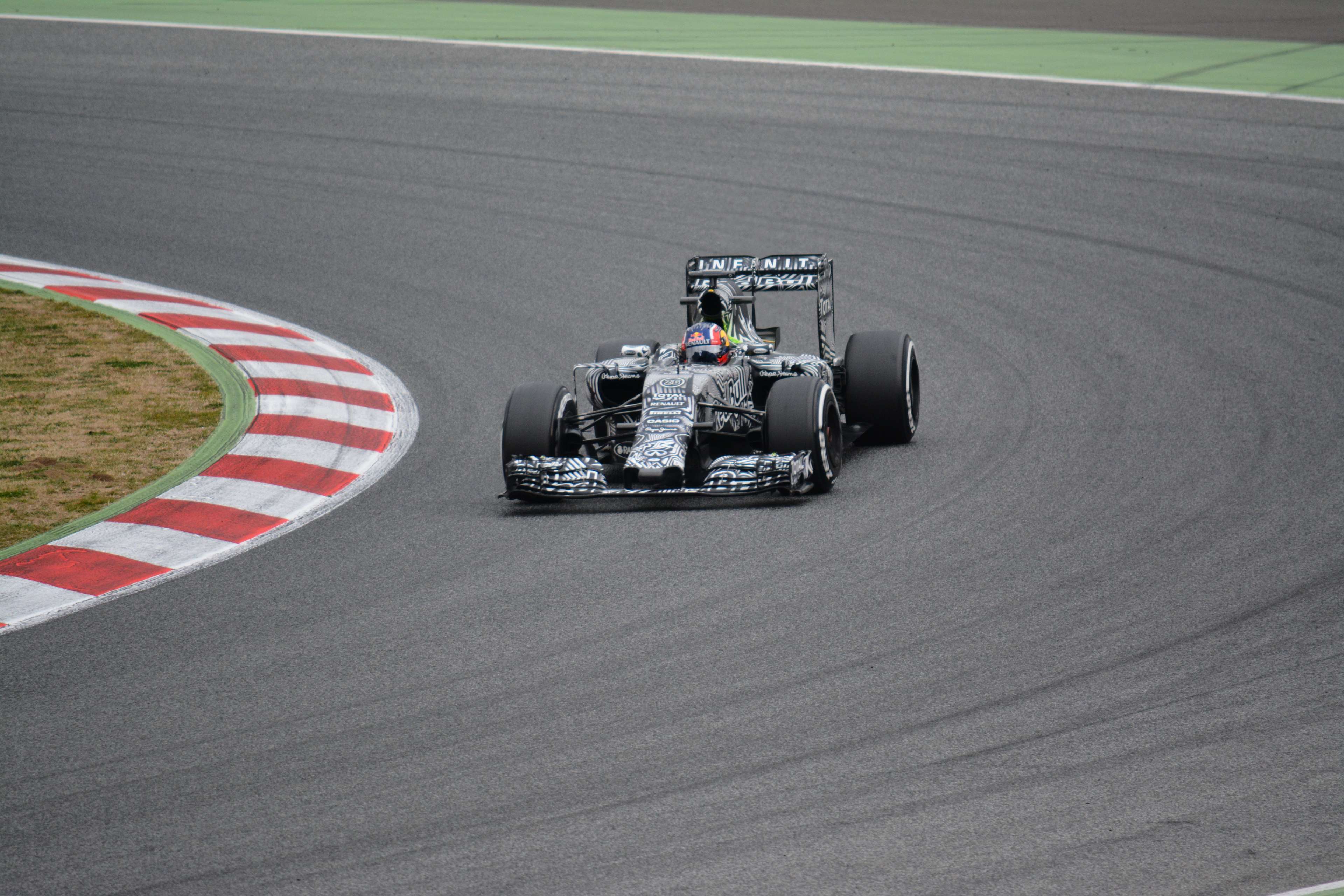 Formula 1 race car on a track HD Wallpaper
