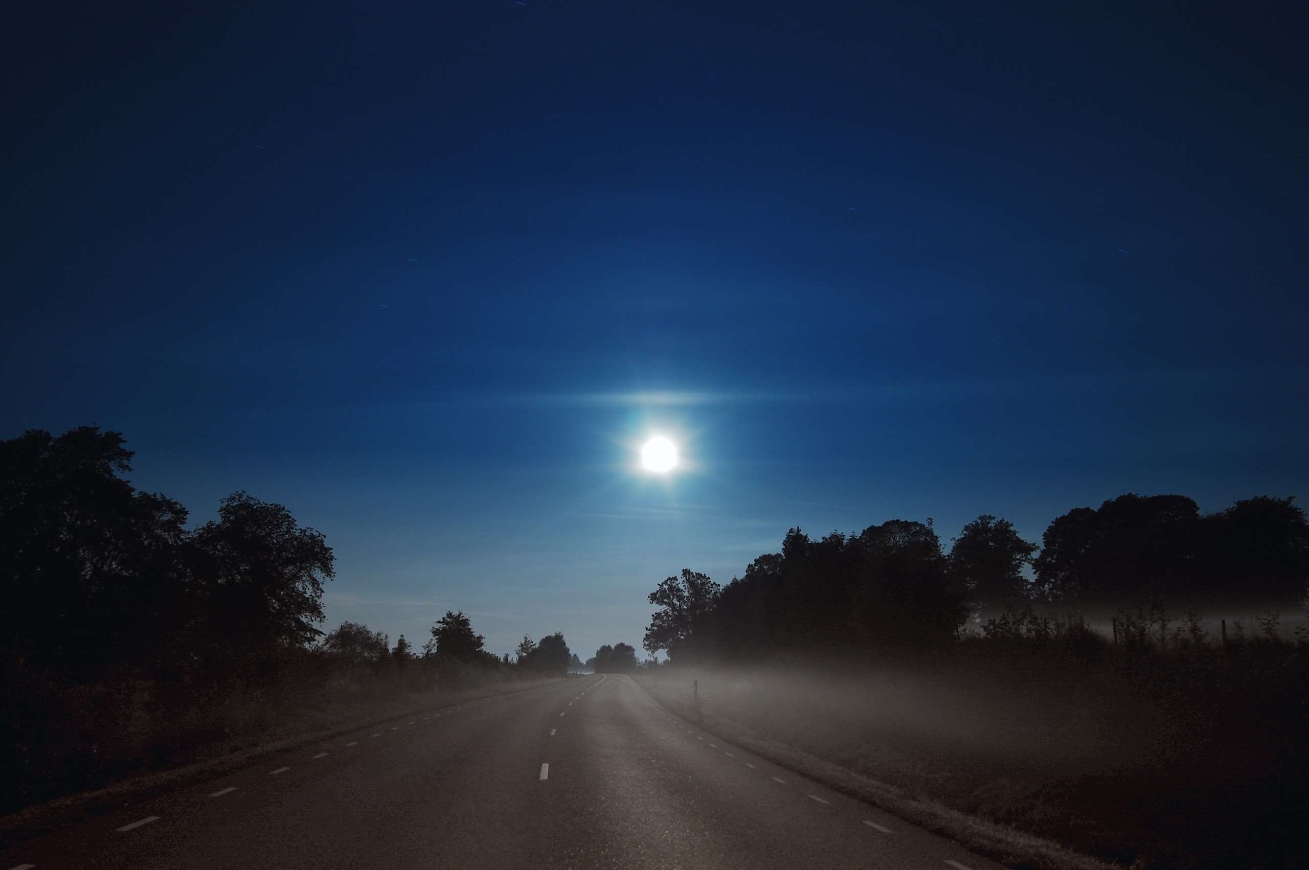 Road at night with full moon and fog HD Wallpaper