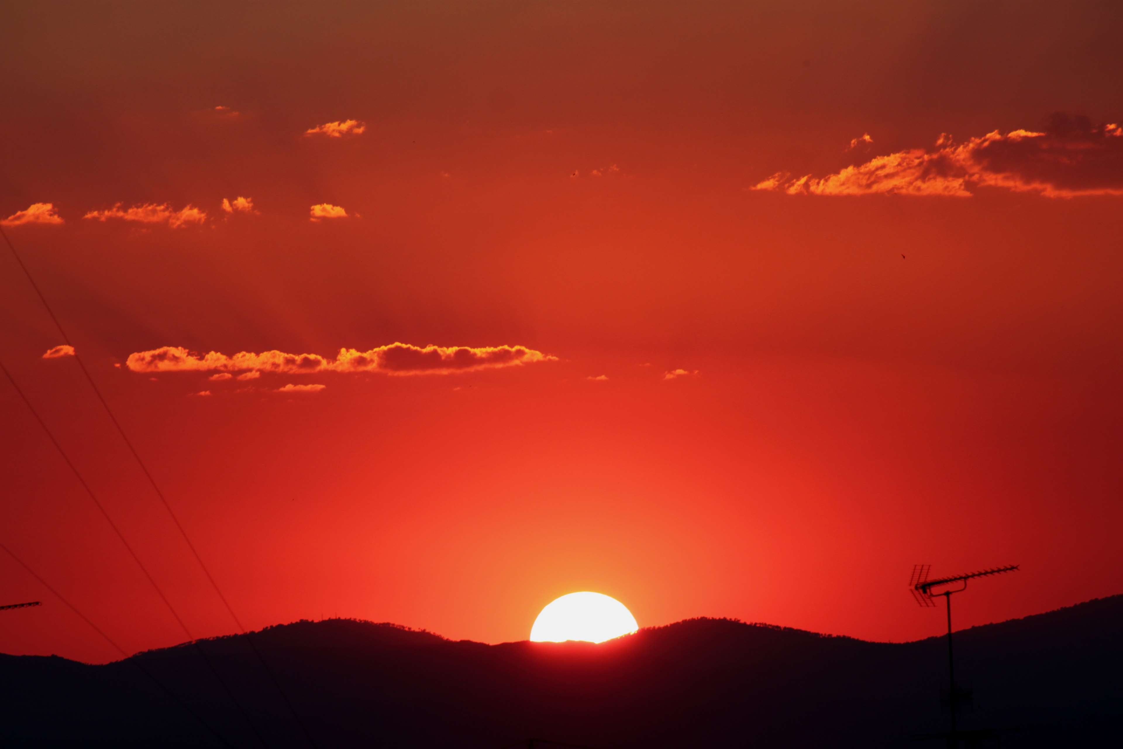 Sunset over mountains with clouds and antenna 4K HD Wallpaper