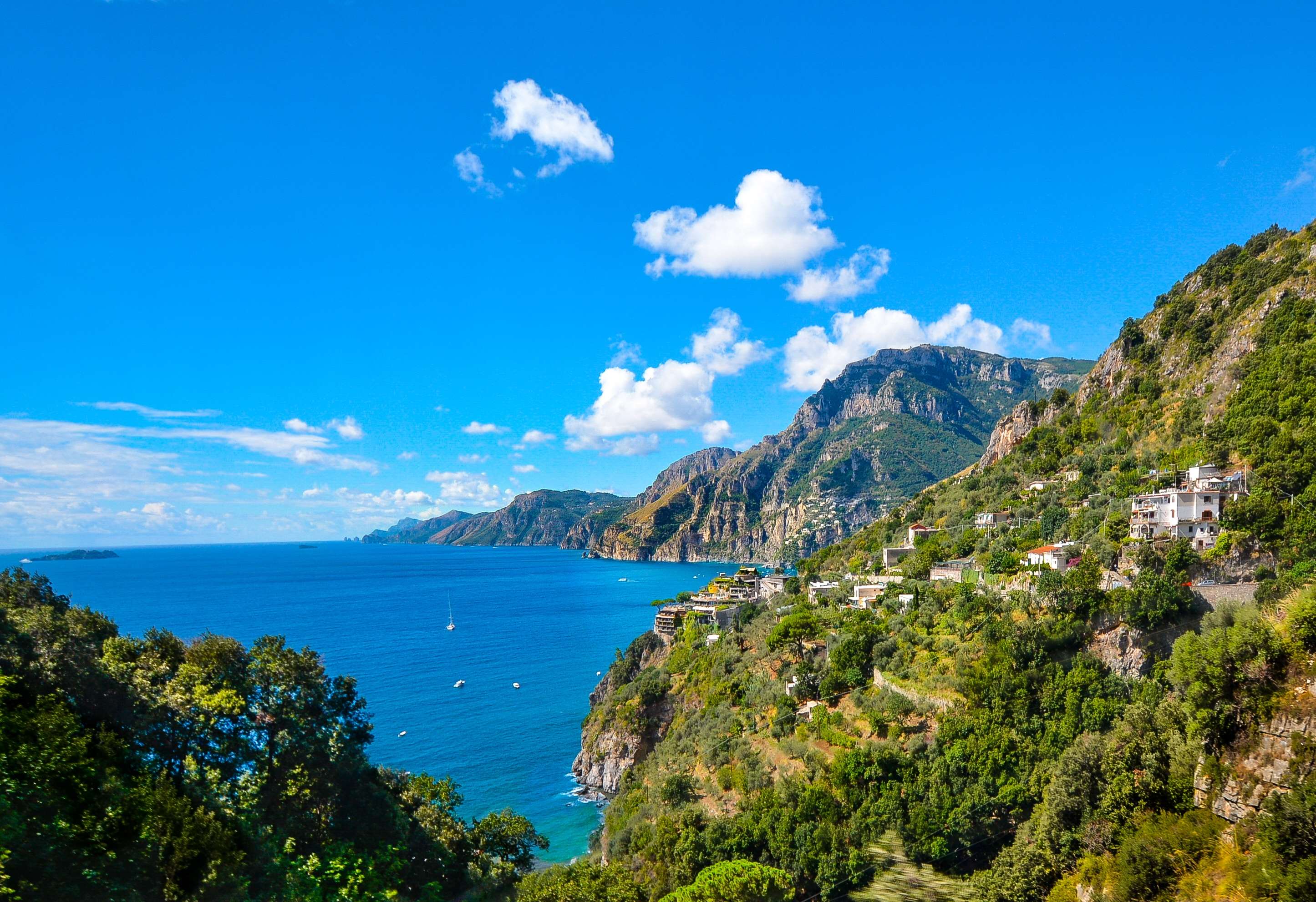 Coastal village on a mountainside overlooking the sea in Italy HD Wallpaper