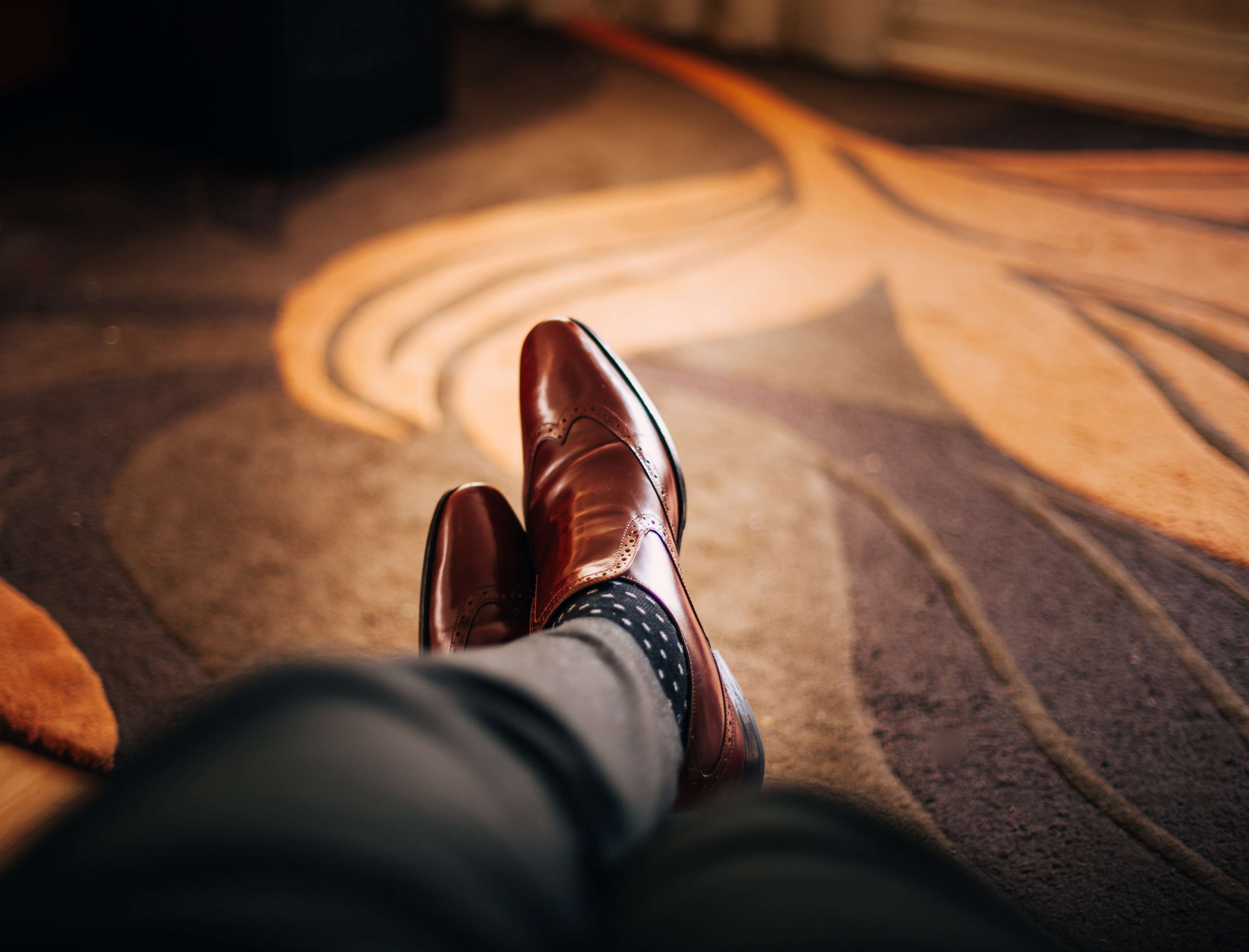 Man wearing brown dress shoes and suit pants HD Wallpaper