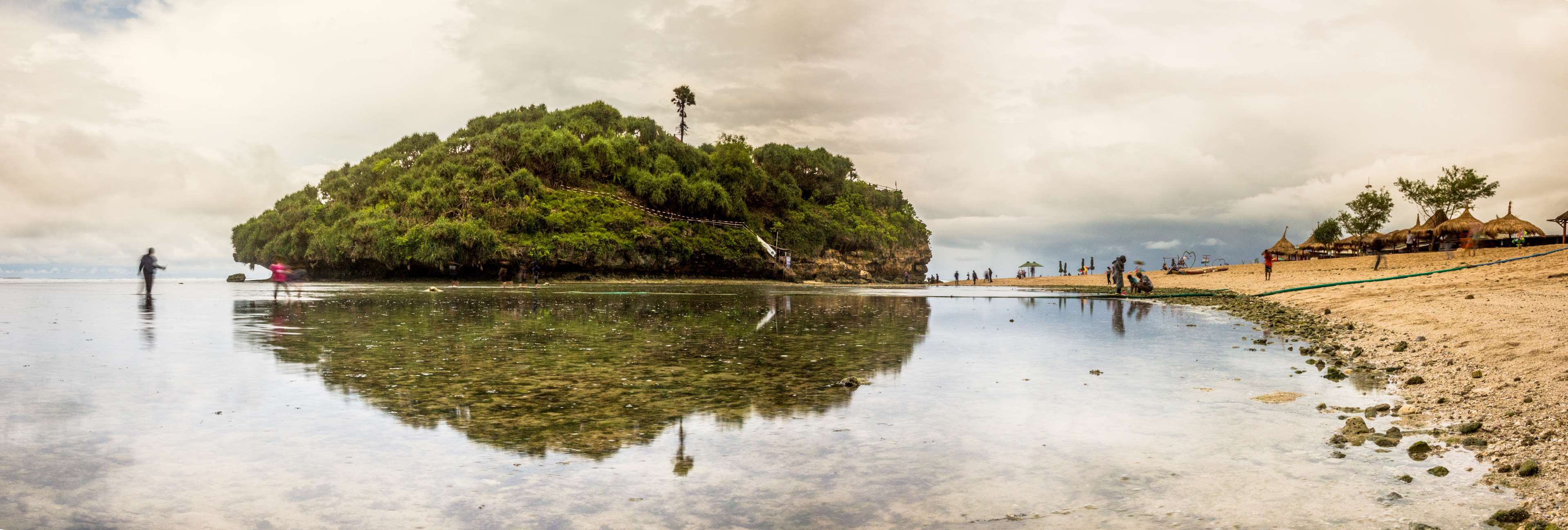 Panorama of a tropical island beach with people HD Wallpaper