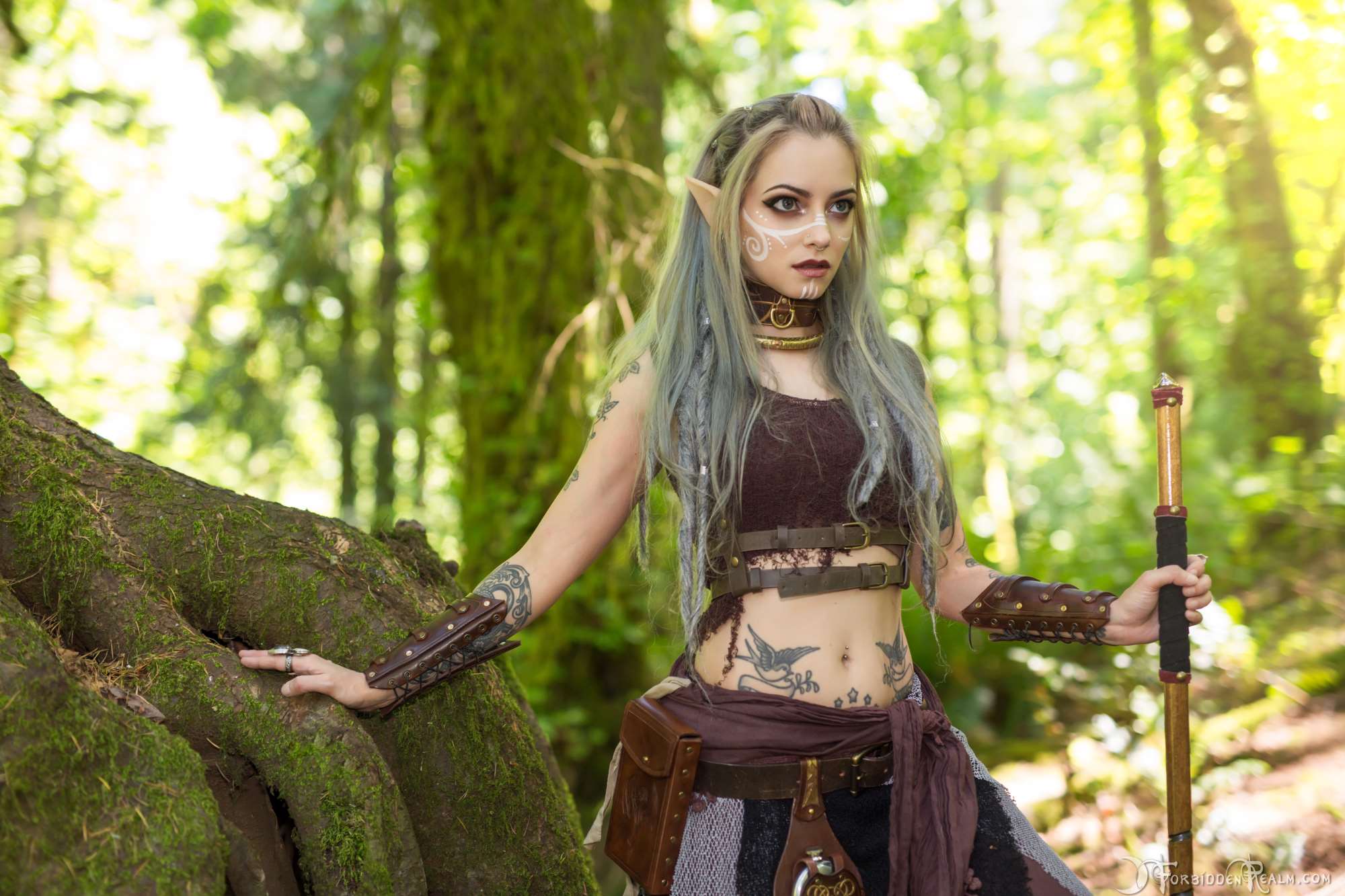 Elf cosplayer with tattoos in a forest HD Wallpaper