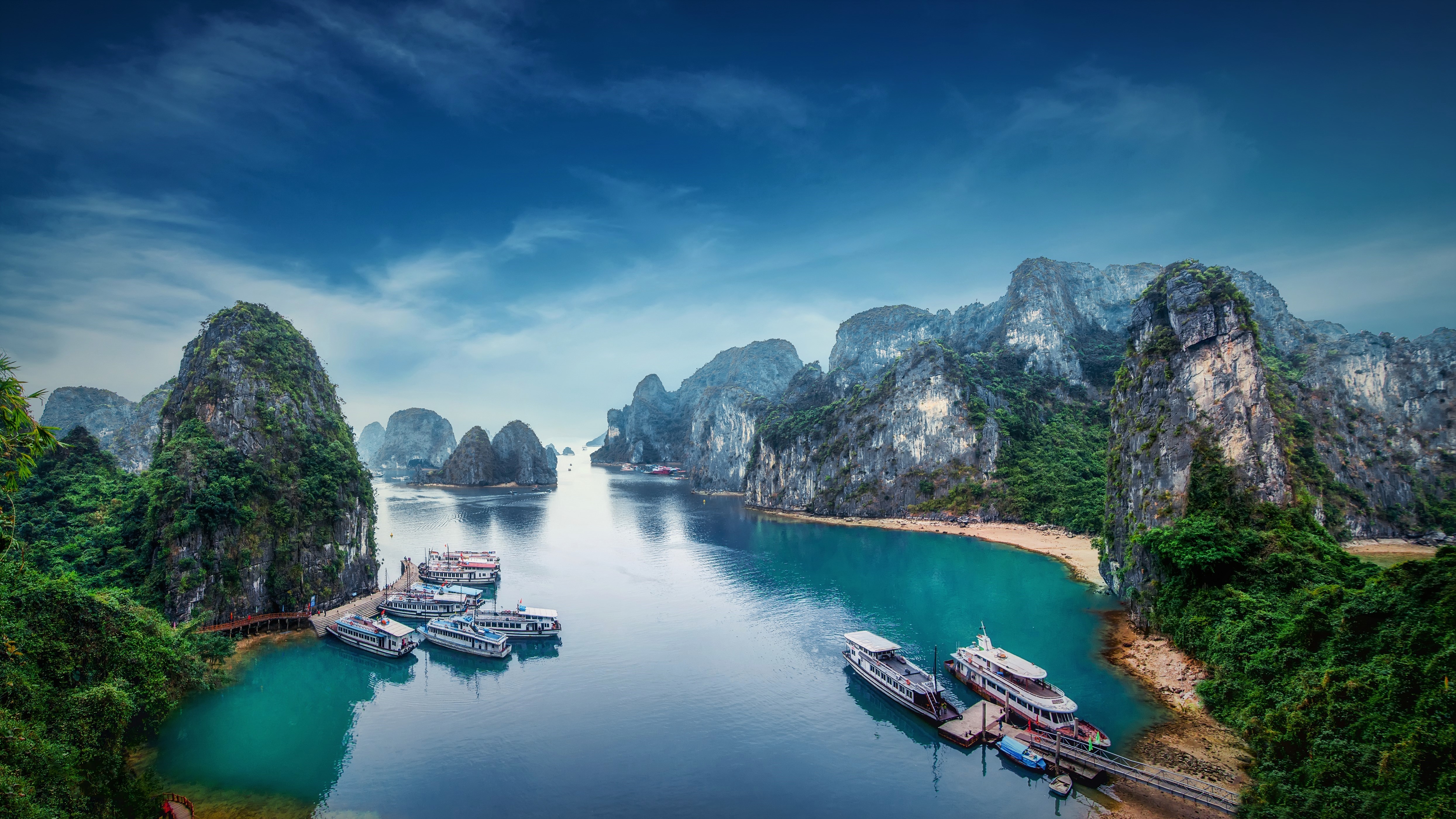Ha Long Bay with boats and limestone karsts HD Wallpaper