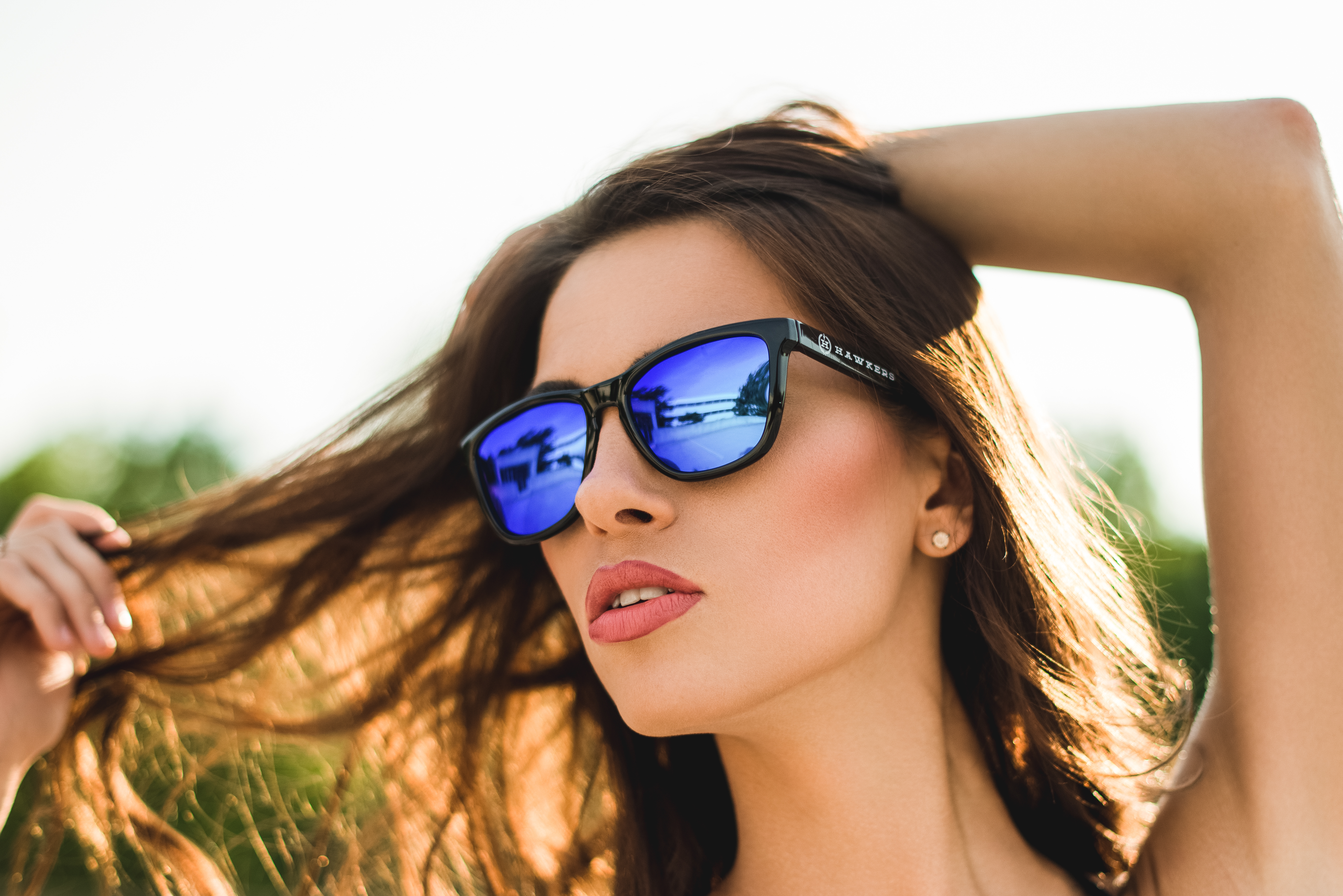 Woman Wearing Reflective Blue Sunglasses in Sunlight 4K HD Wallpaper