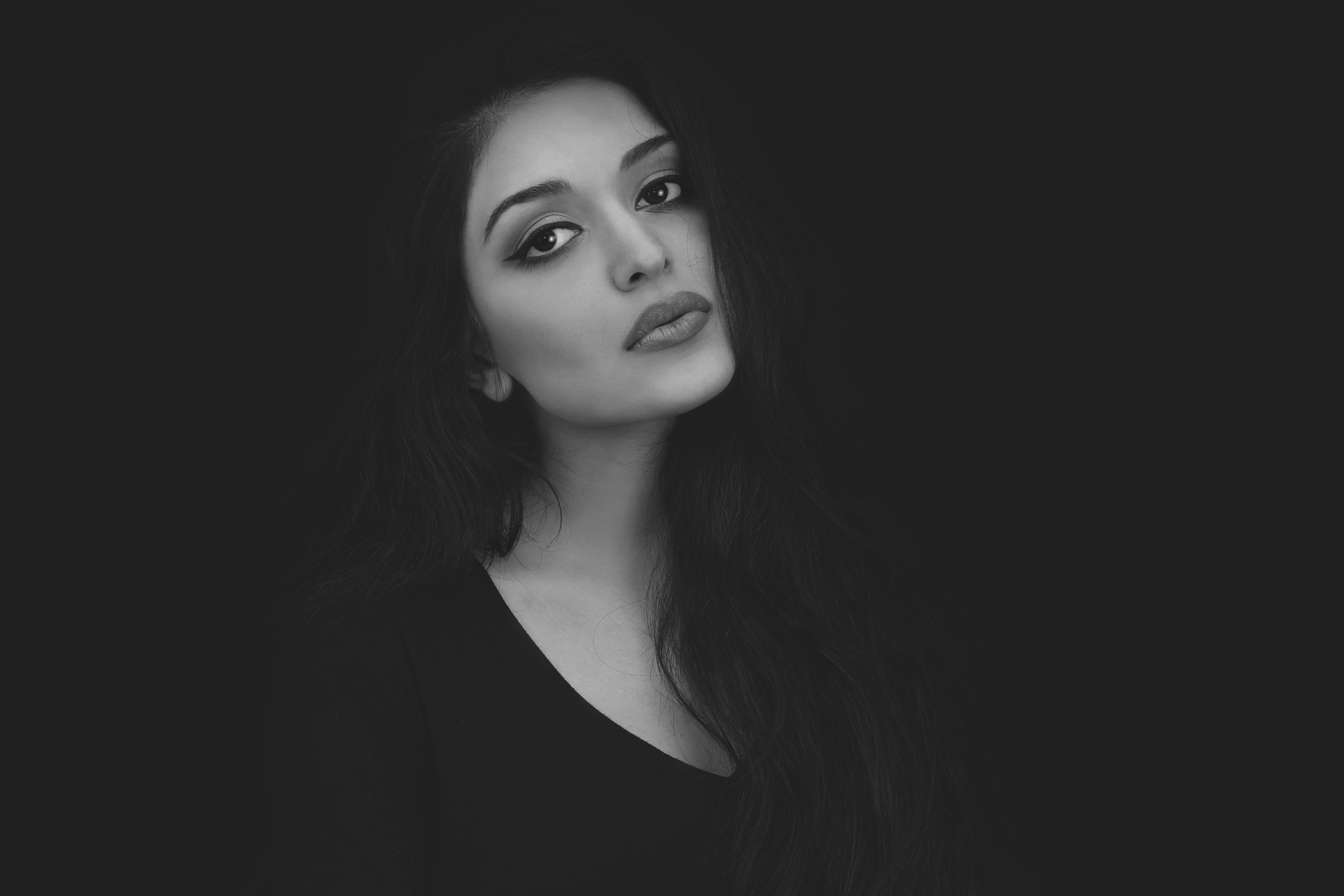 Monochrome Portrait of Woman with Intense Gaze 4K HD Wallpaper