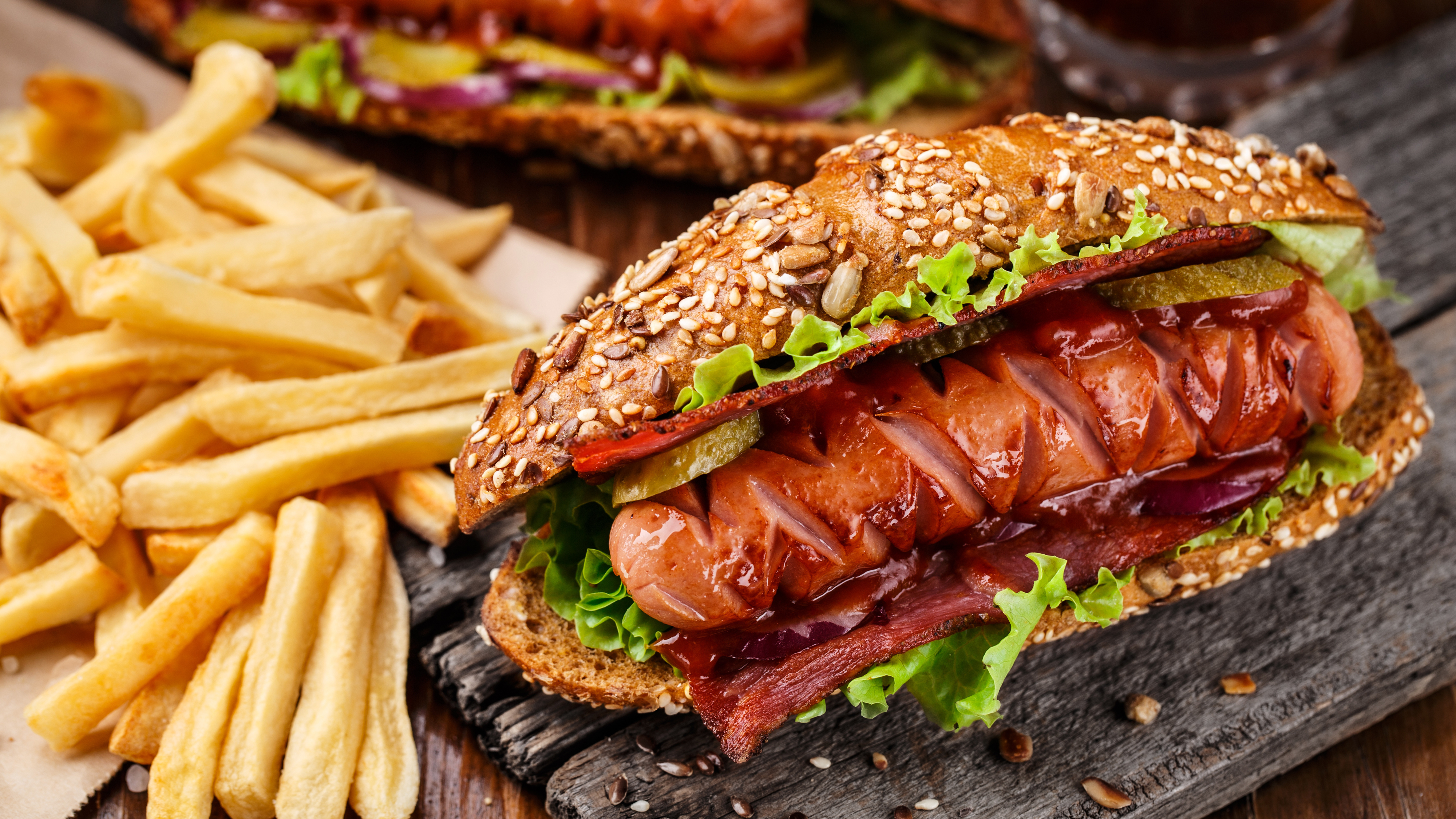 Delicious Hot Dog with French Fries on Wooden Table HD Wallpaper