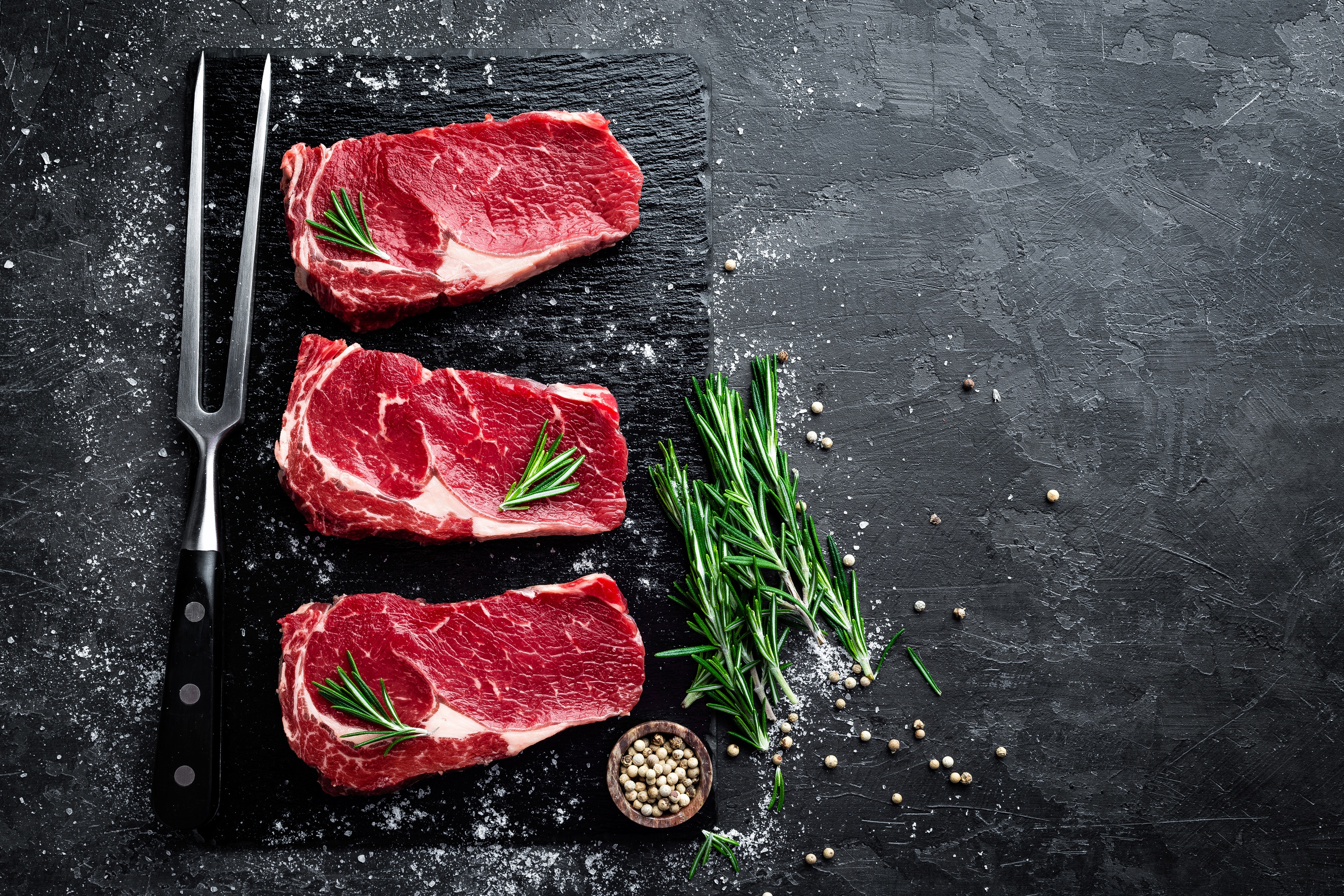 Fresh Raw Steaks with Herbs and Seasoning HD Wallpaper