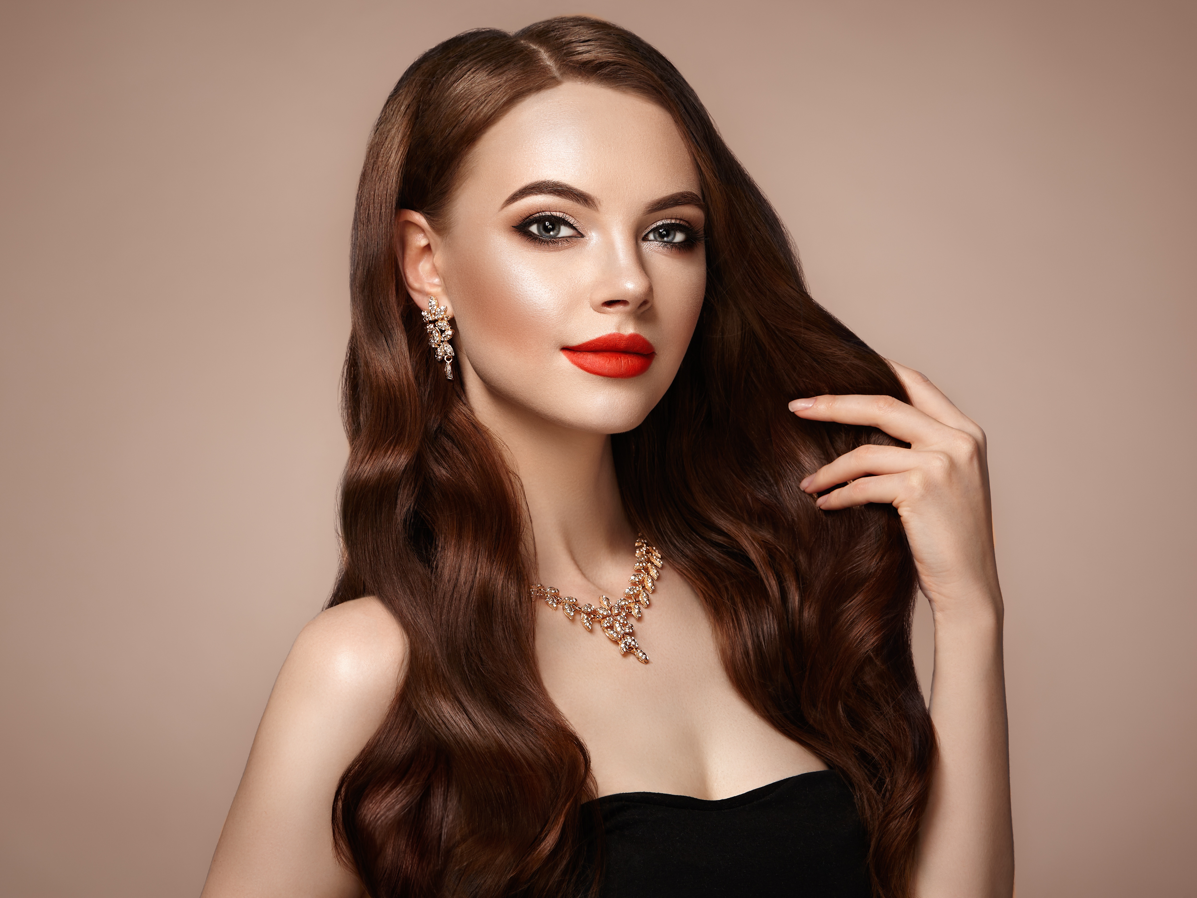 Woman with long brown hair, red lipstick, and jewelry HD Wallpaper