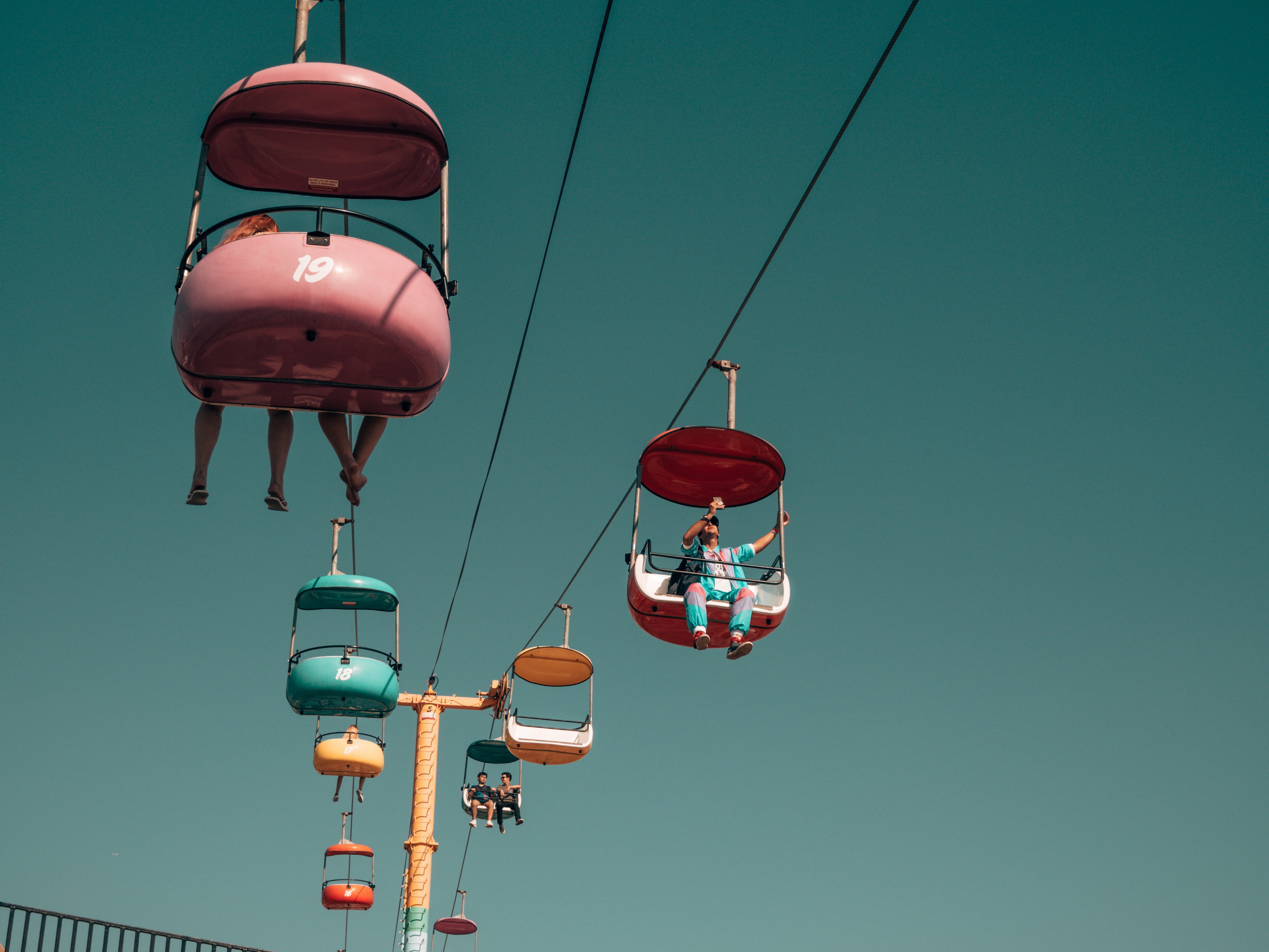 Colorful cable cars on a sunny day HD Wallpaper