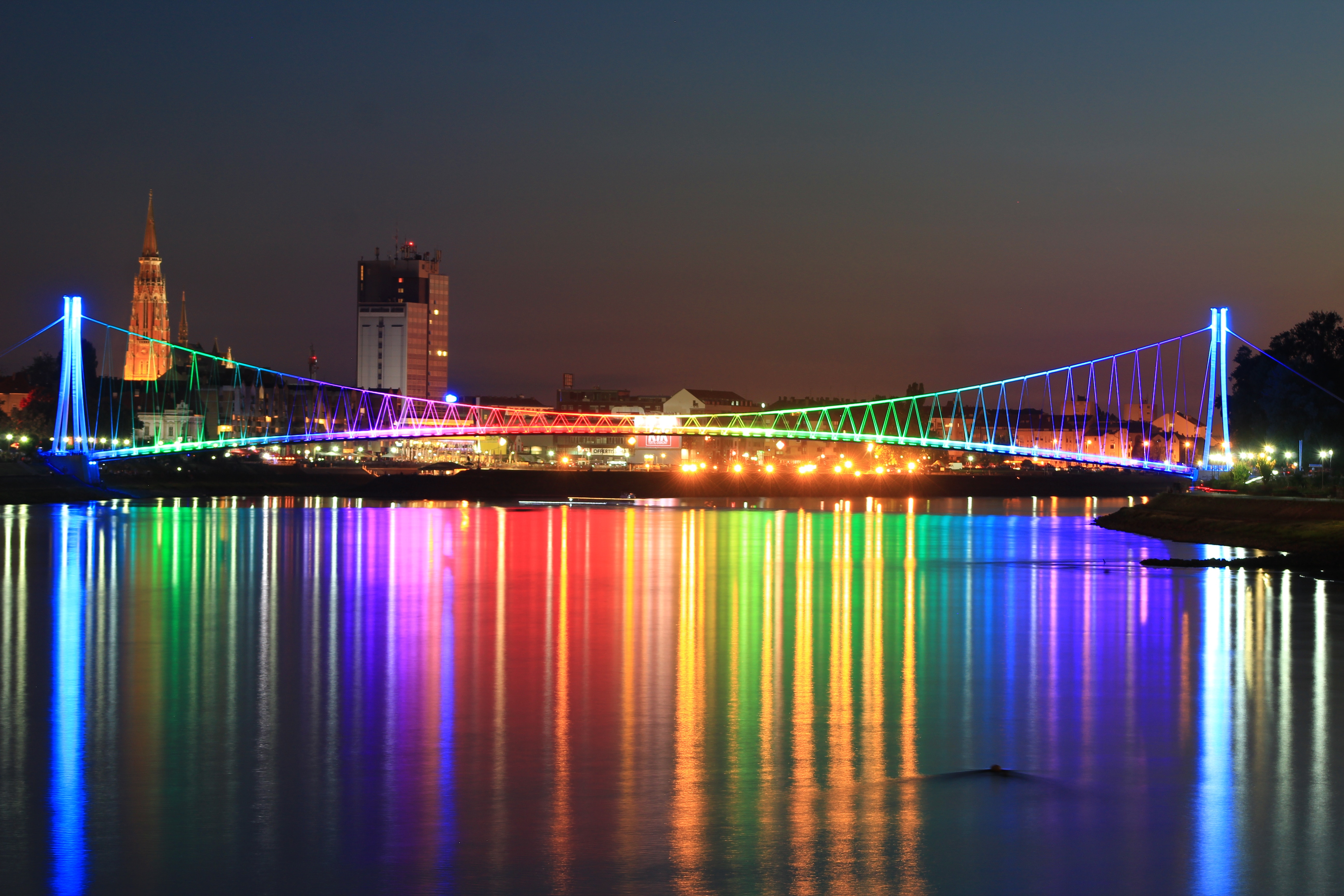 Colorful illuminated bridge over Drava river in Osijek HD Wallpaper