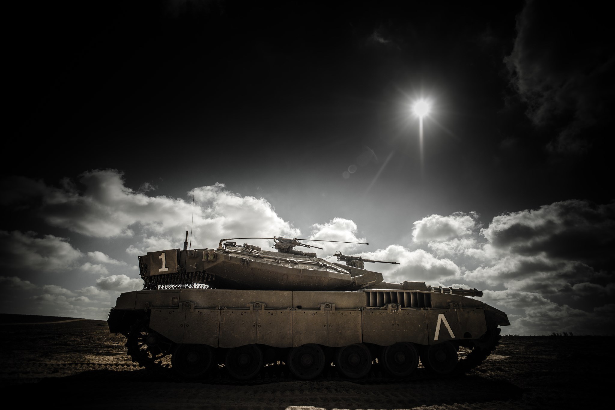 Merkava tank under a dramatic sky HD Wallpaper