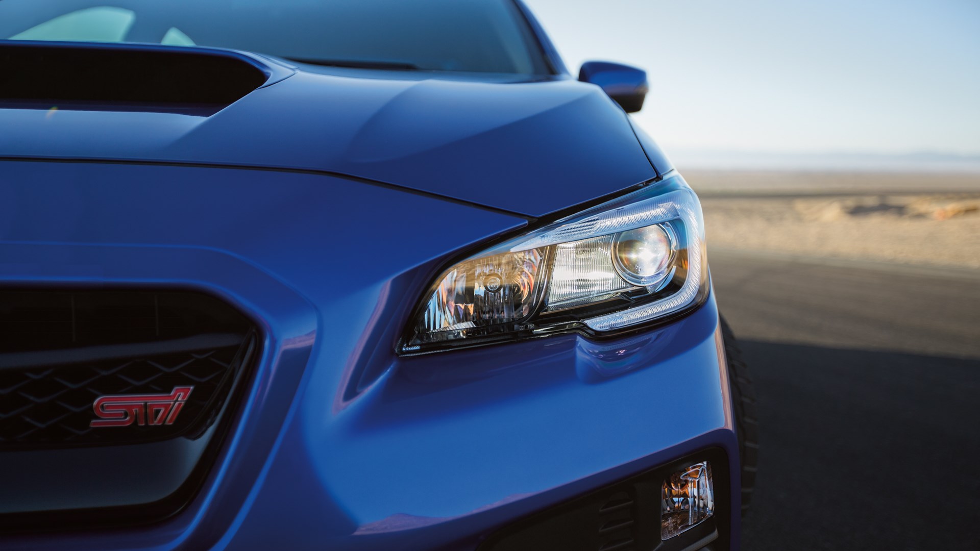 Blue Subaru WRX STI front grille and headlight HD Wallpaper