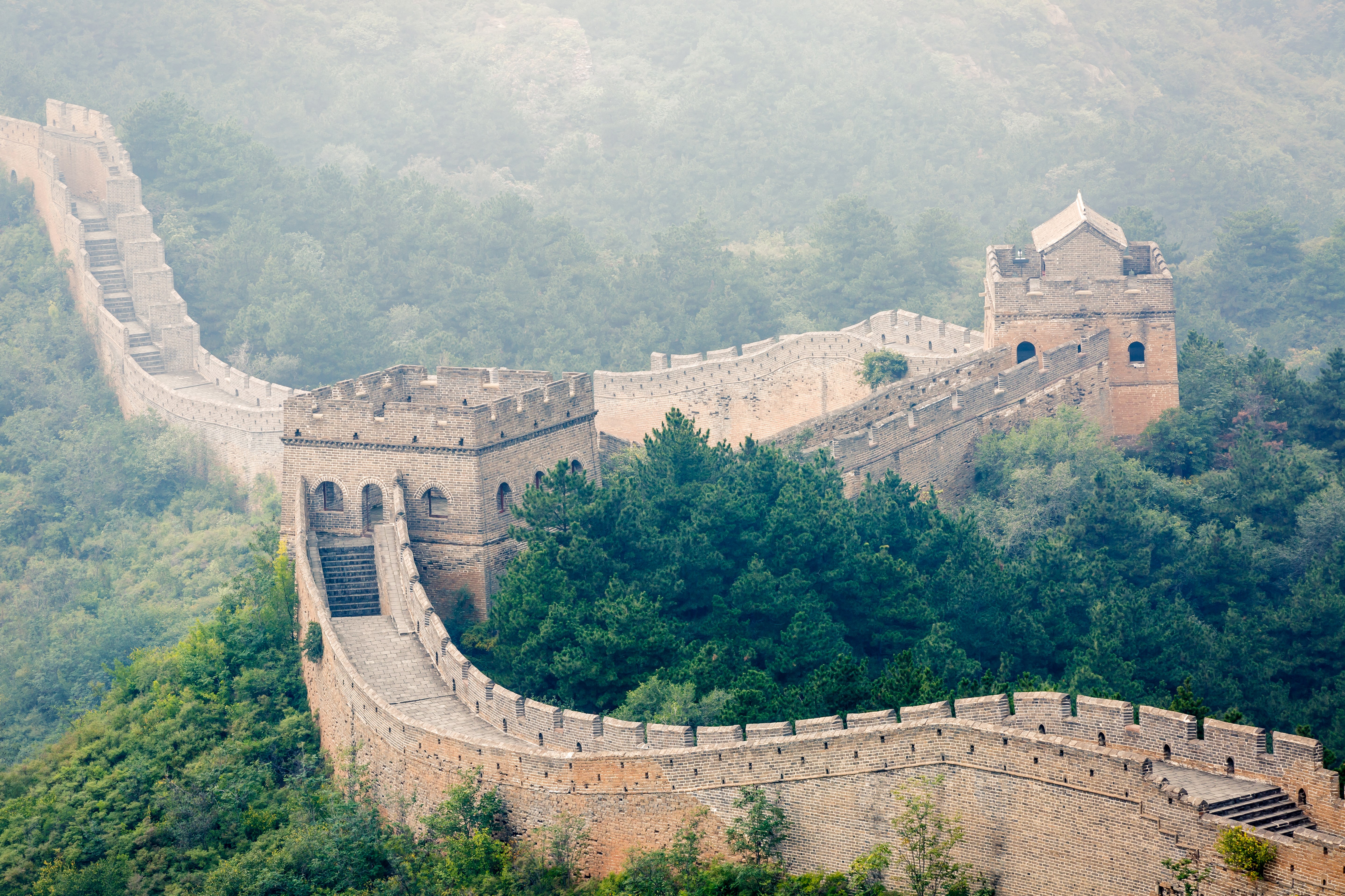 The Great Wall of China in misty mountains HD Wallpaper
