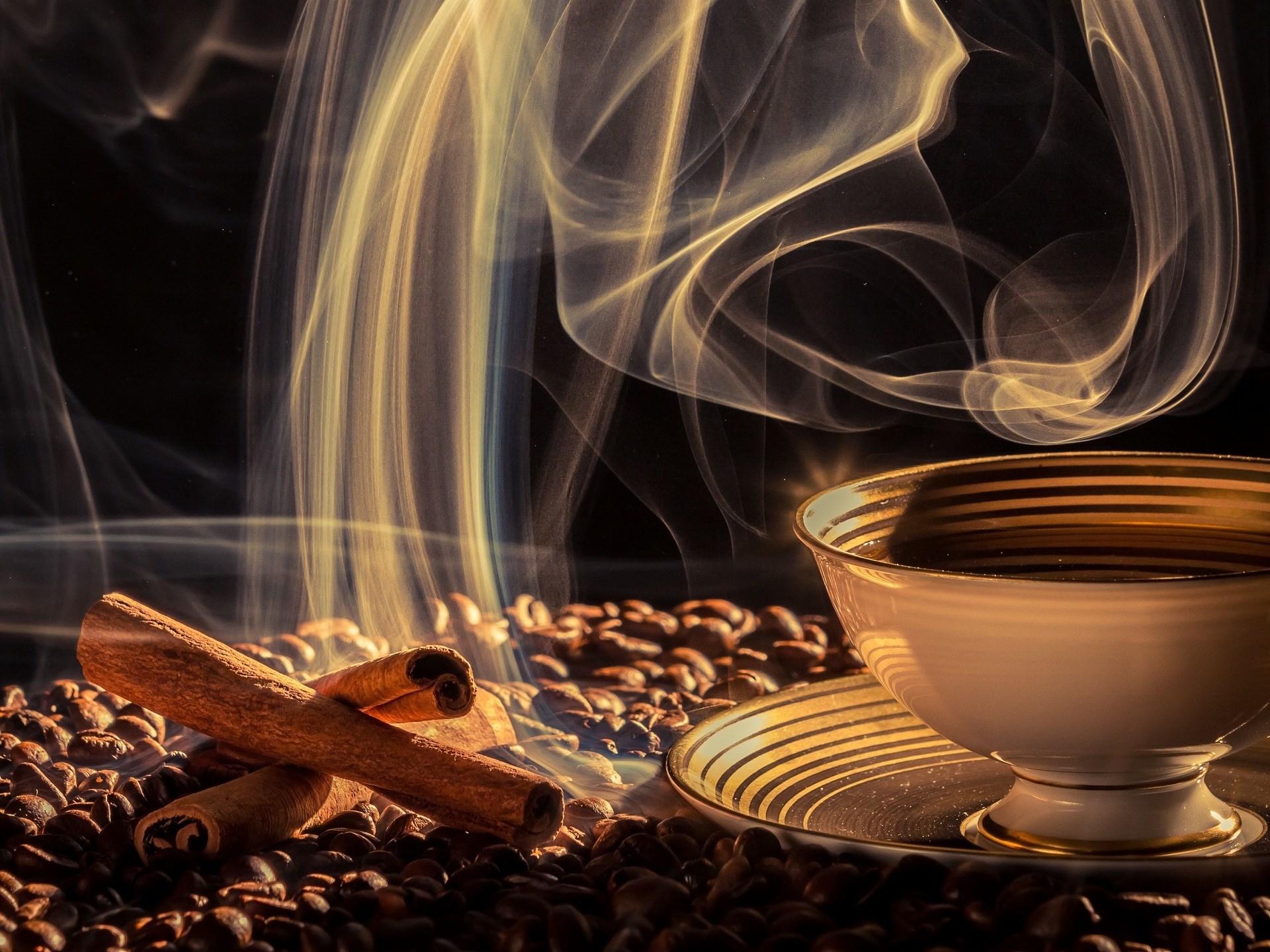 Coffee beans with cinnamon sticks and steaming cup HD Wallpaper
