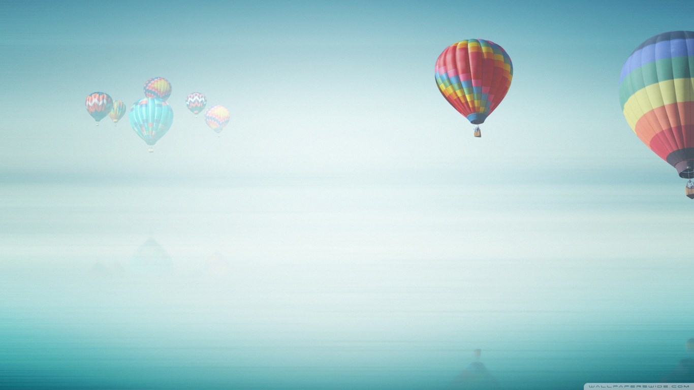Hot air balloons floating over a calm body of water HD Wallpaper
