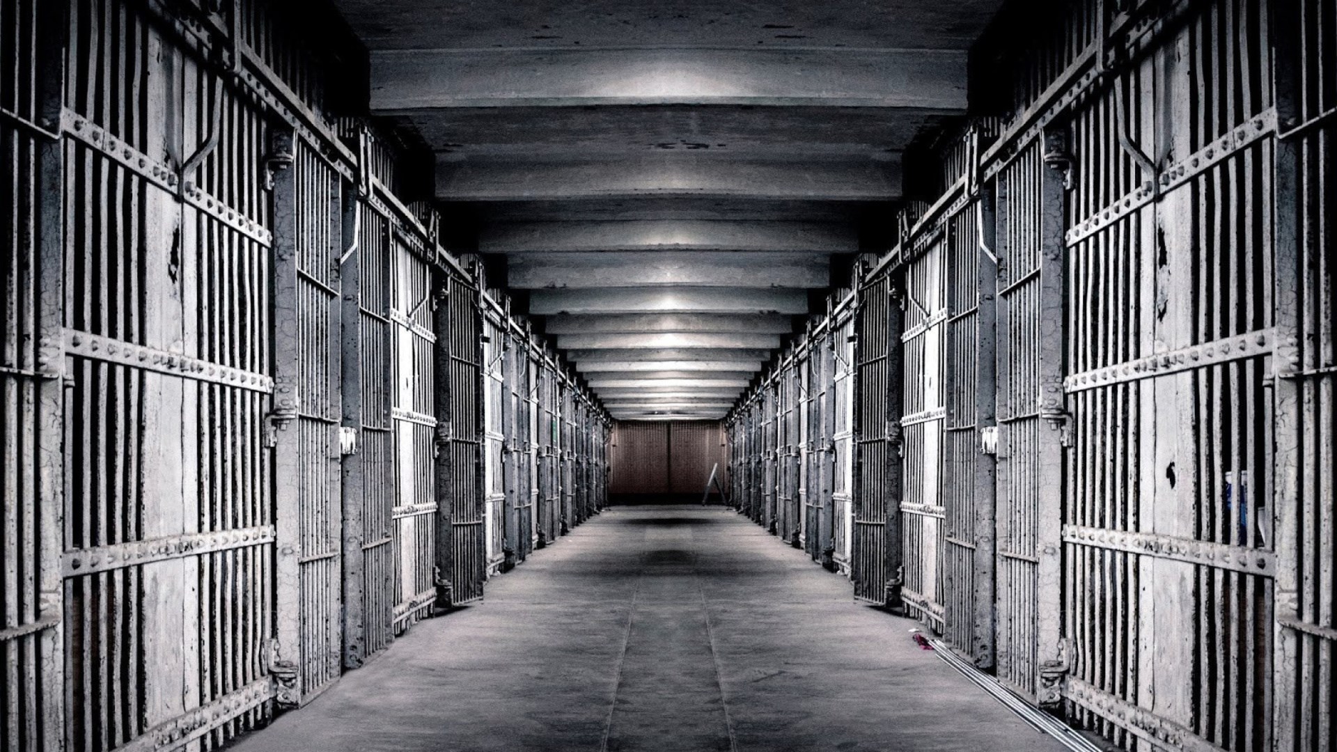 Prison corridor with cells HD Wallpaper