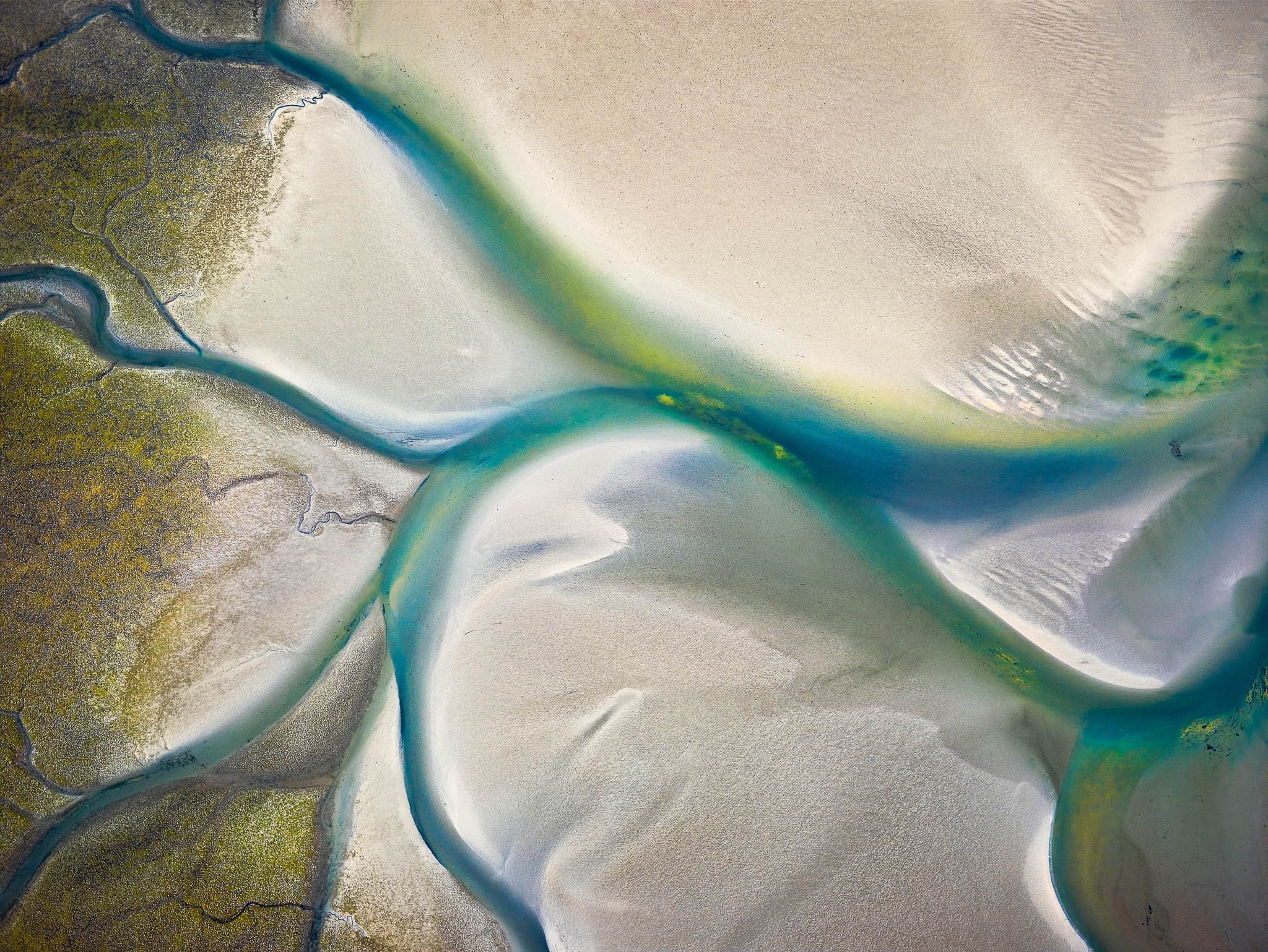 Aerial view of river delta with turquoise water and sandbanks HD Wallpaper