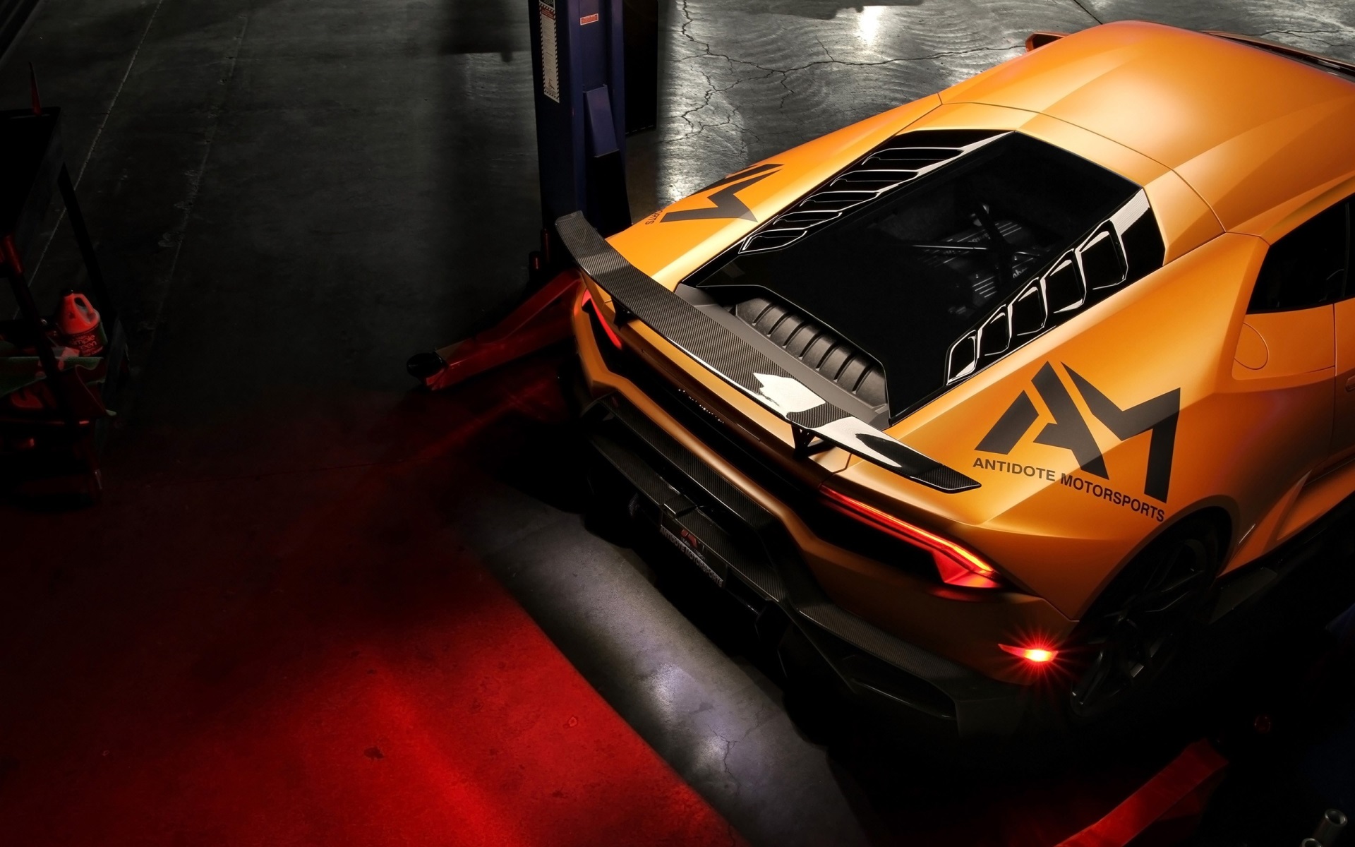 Orange Lamborghini with Antidote Motorsports logo HD Wallpaper