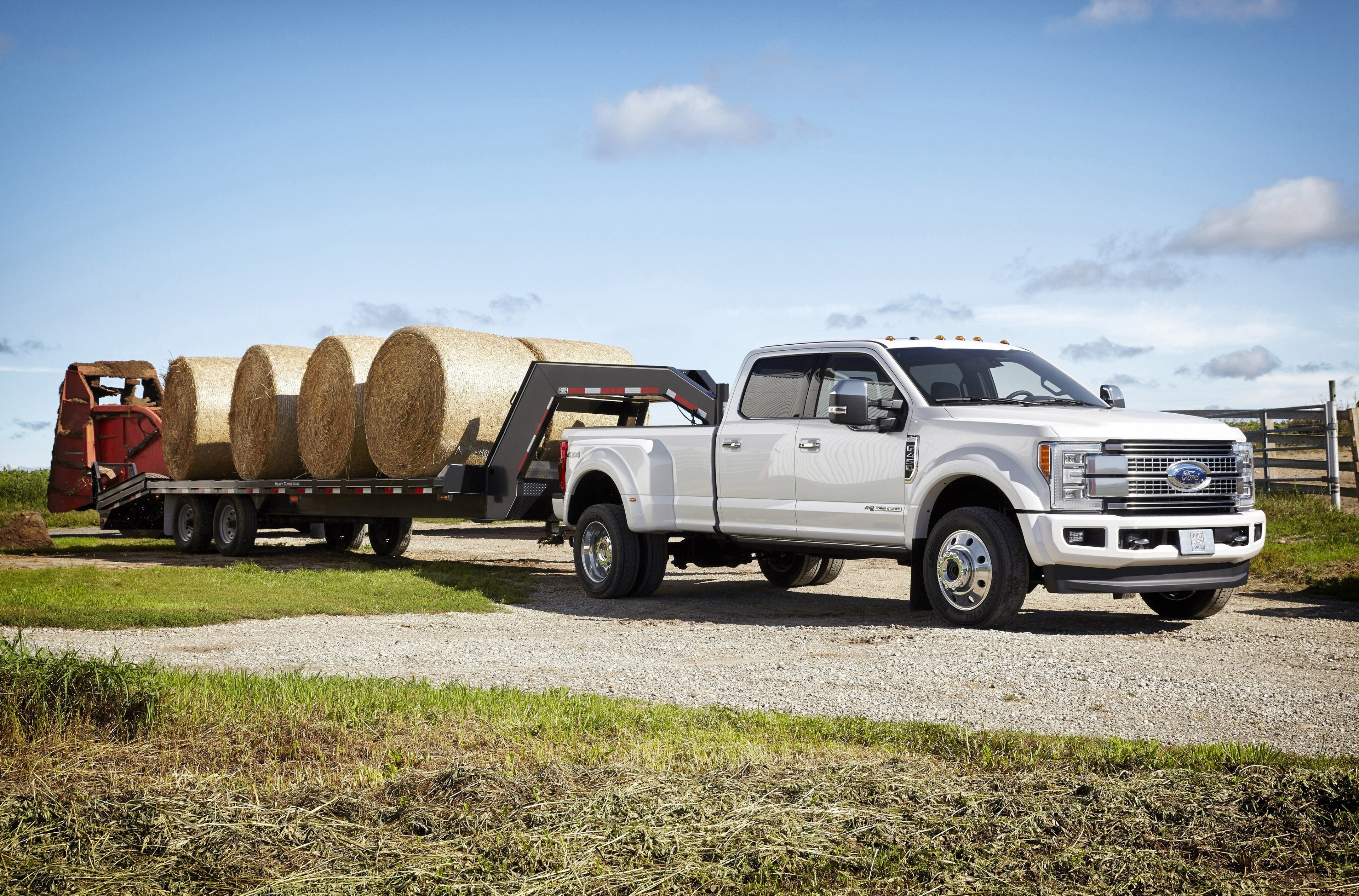 White Ford F-450 Truck Towing Hay Bales HD Wallpaper