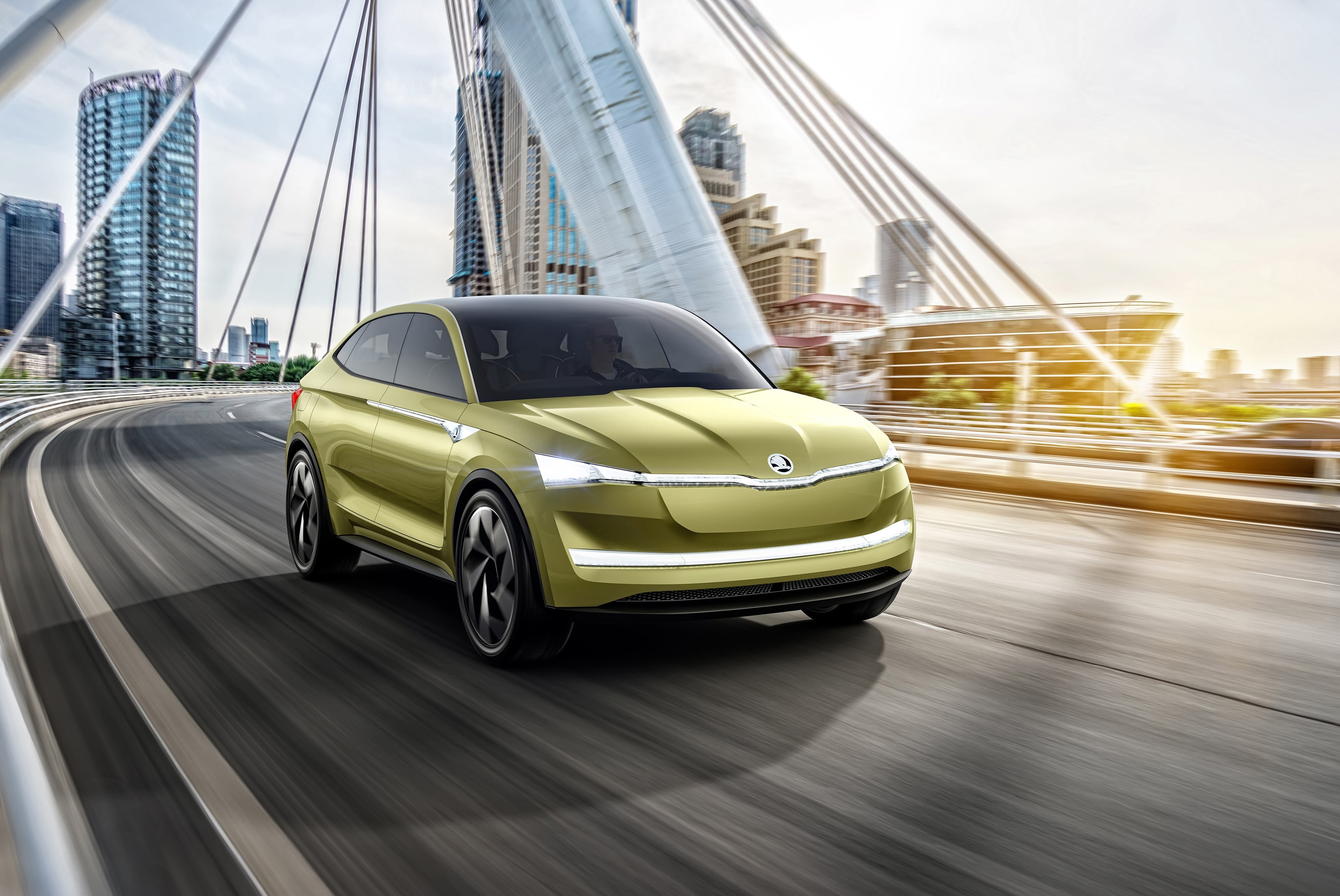 Skoda Vision E concept car on a bridge HD Wallpaper