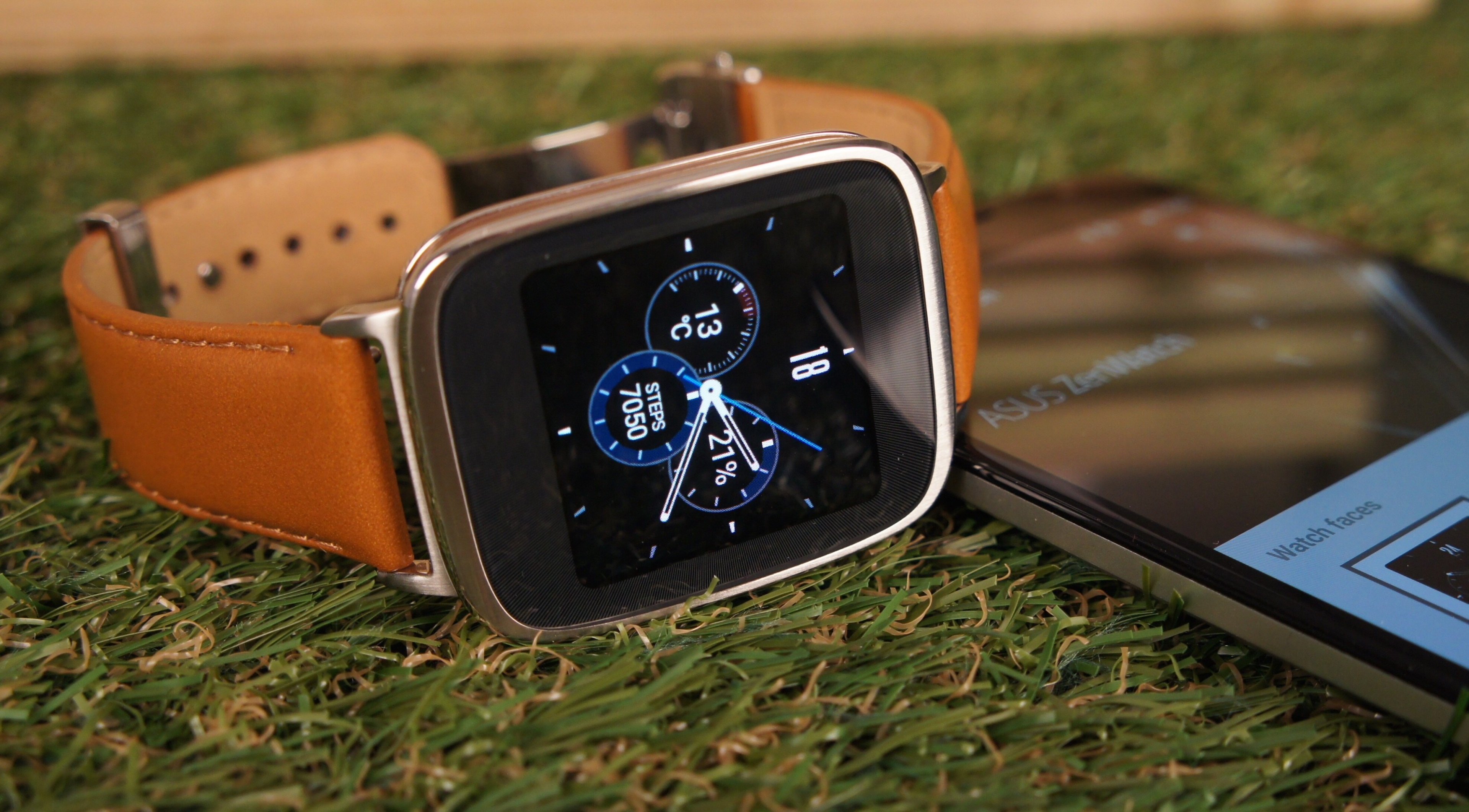 ASUS ZenWatch 2 on grass with phone HD Wallpaper