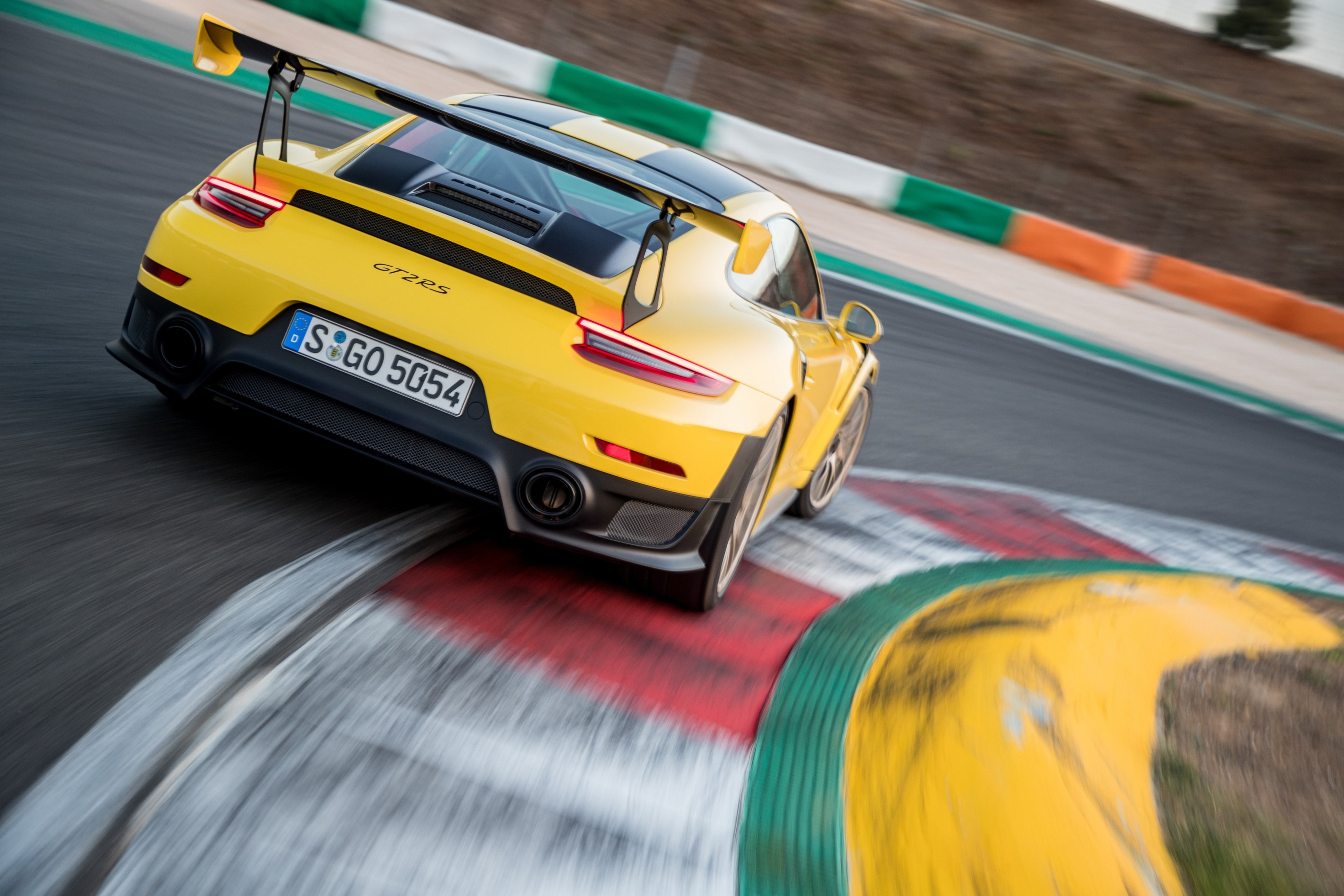 Yellow Porsche GT2 RS on a Race Track HD Wallpaper