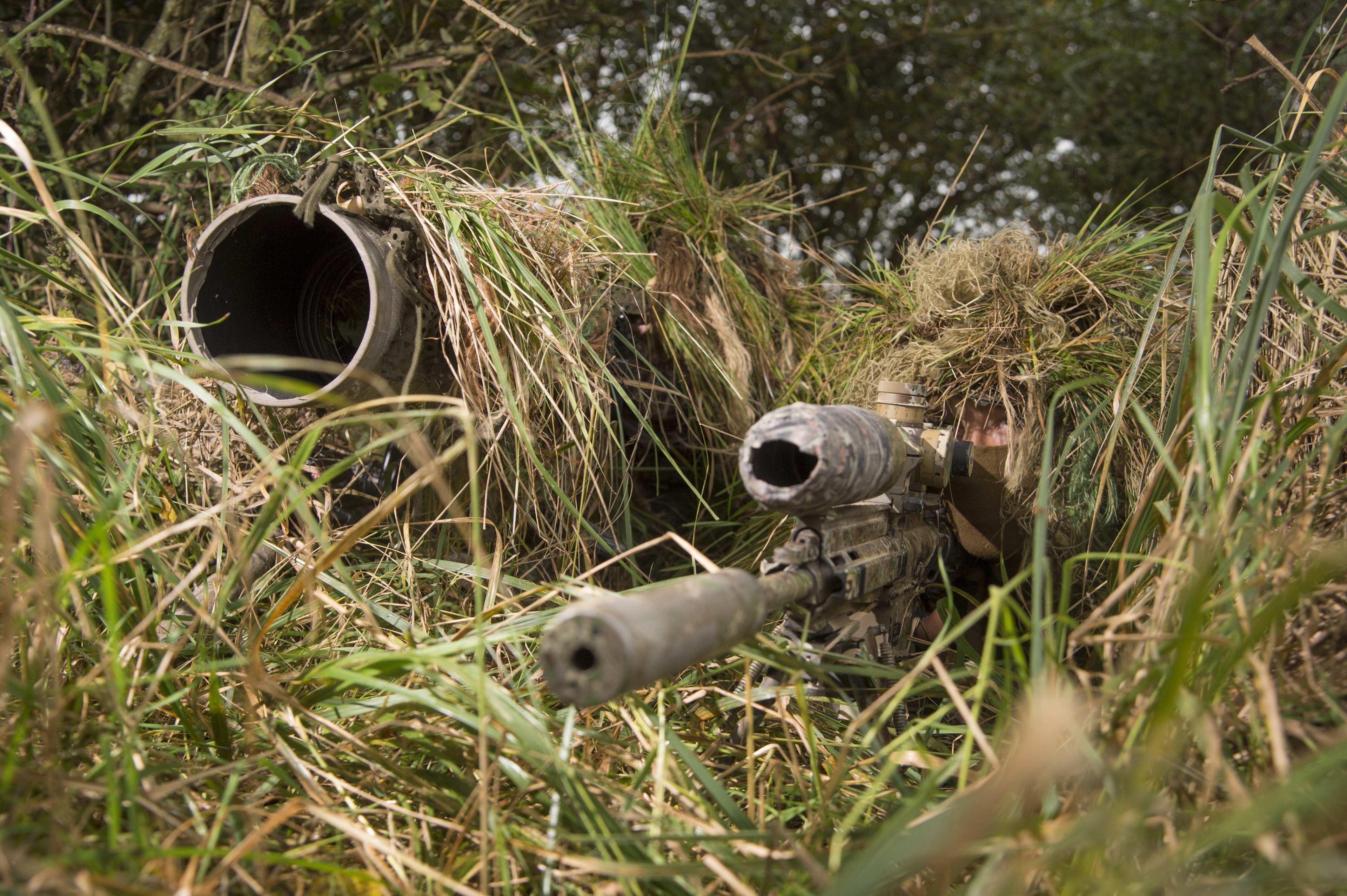 Sniper in ghillie suit with rifle HD Wallpaper