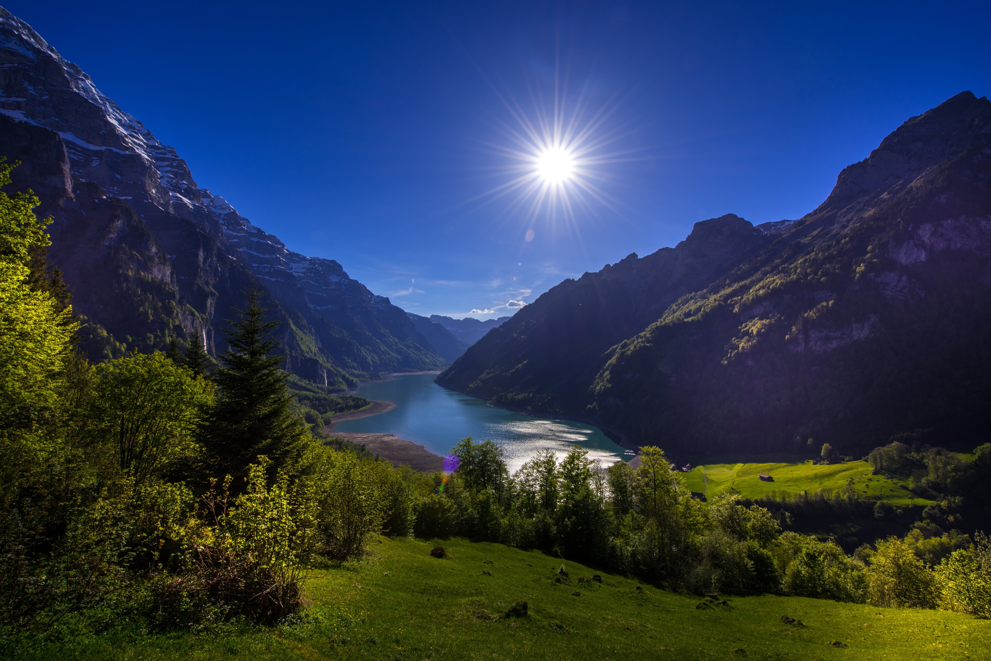 Mountain valley with lake and sun HD Wallpaper
